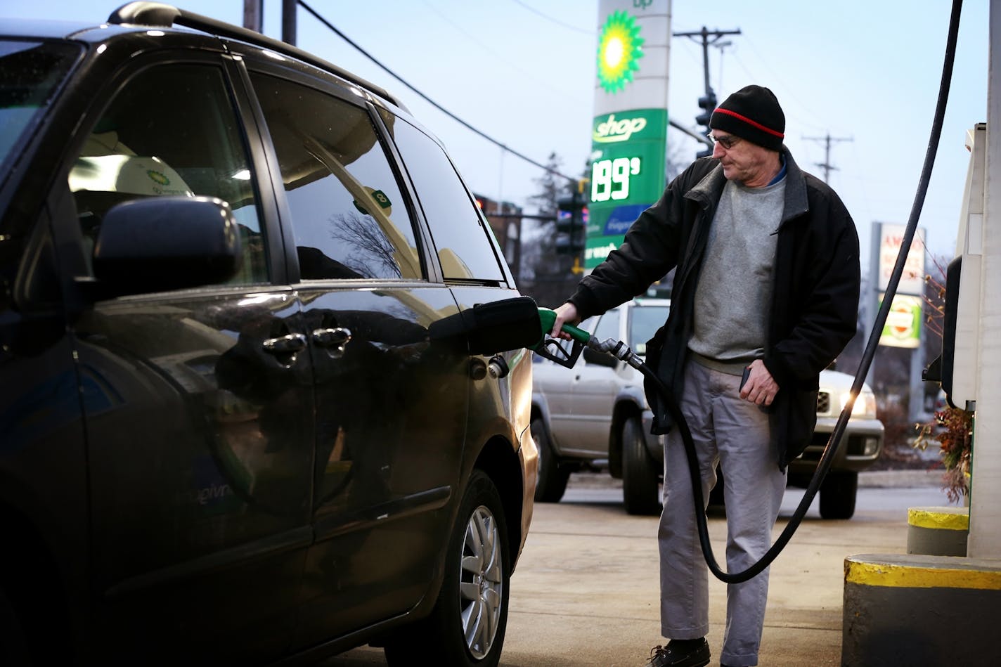 File: David Wiese of Minneapolis pumps gas at the BP gas station on Lyndale Avenue near W 36th Street in south Minneapolis.