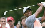 Tiger Woods tees off on the third hole during the pro-am at the Wyndham Championship golf tournament, Wednesday, Aug. 19, 2015, at Sedgefield Country 