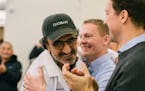 Hamdi Ulukaya, left, a Turkish immigrant who founded the yogurt company Chobani in 2005, during an announcement that he would give employees shares wo
