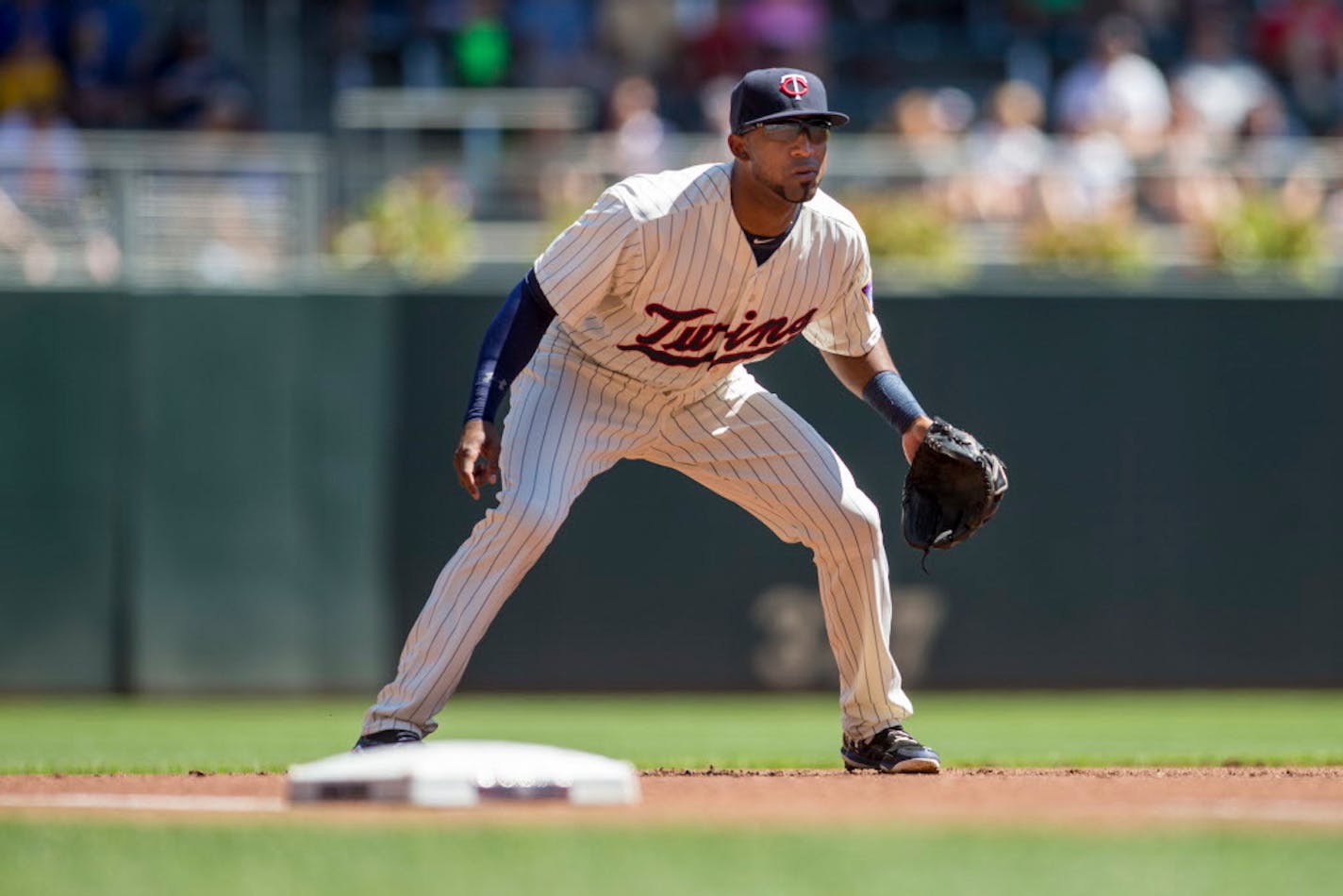 Minnesota Twins third baseman Eduardo Nunez (9) prepares to field a ball hit by Pittsburgh Pirates in the first inning of a baseball game Wednesday, July 29, 2015, in Minneapolis. The Pittsburgh Pirates won 10-4. (AP Photo/Bruce Kluckhohn)