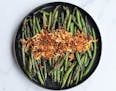 Blistered Green Beans with Crispy Chiles and Shallots. Credit: Meredith Deeds, Special to the Star Tribune