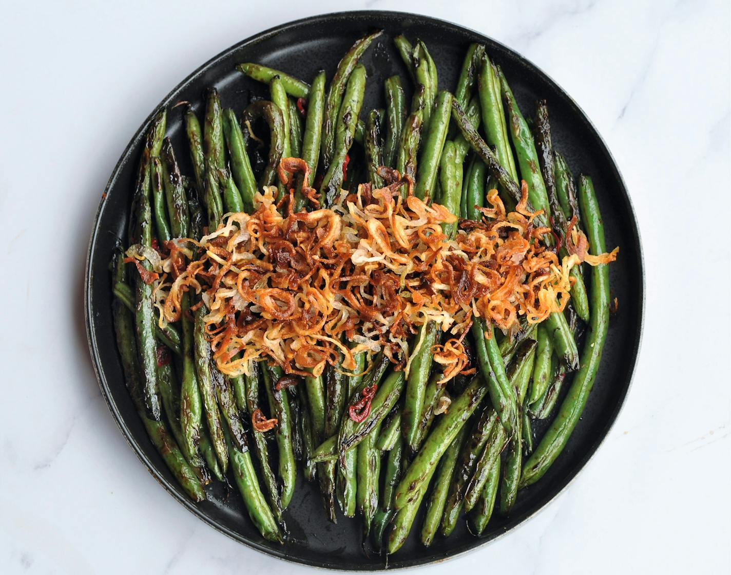 Blistered Green Beans with Crispy Chiles and Shallots. Credit: Meredith Deeds, Special to the Star Tribune