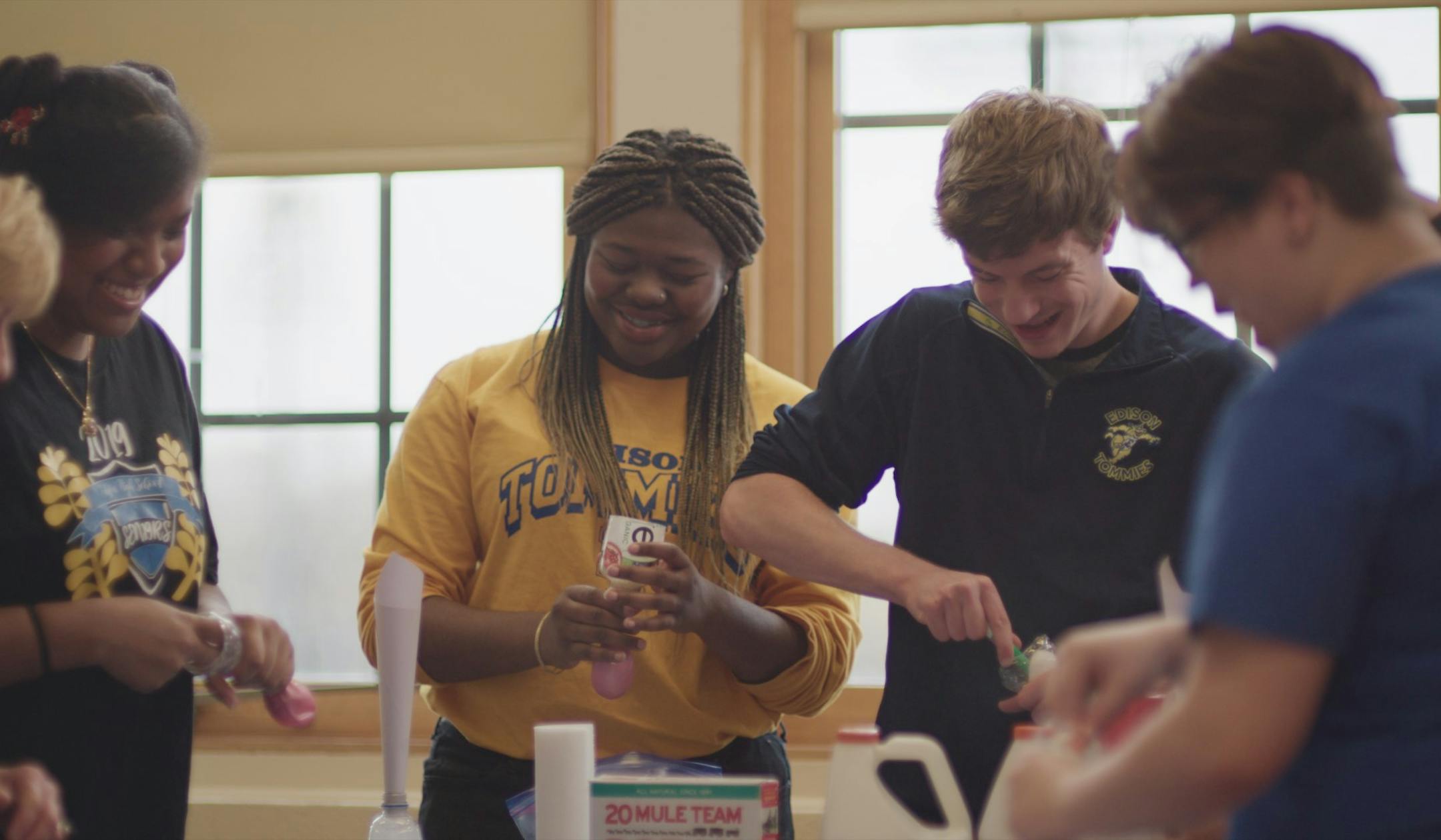 The Junior Achievement business company from Minneapolis Edison High, including Takia Thomas (center) and Brandon Arneson, (center-right) took second place in the Upper Midwest competion for its Stress Less squeezable product and accompany mental health information. Photo: Junior Achievement