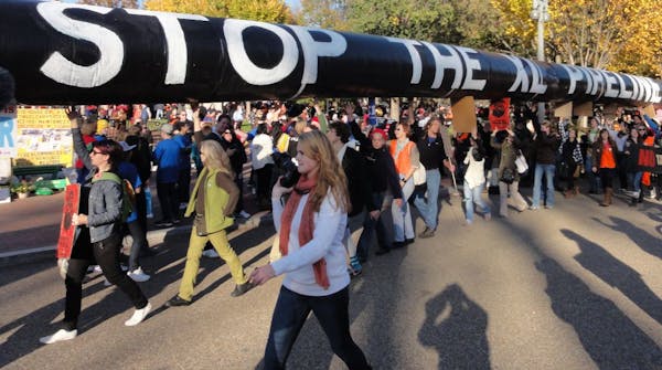 Protesters encircled the White House on Nov. 6 to object to the proposed Keystone XL oil pipeline. President Obama recently delayed a decision on the 
