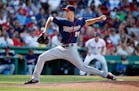 Minnesota Twins' Taylor Rogers pitches during the eighth inning of a baseball game against the Boston Red Sox in Boston, Sunday, July 24, 2016.