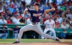 Minnesota Twins' Taylor Rogers pitches during the eighth inning of a baseball game against the Boston Red Sox in Boston, Sunday, July 24, 2016.