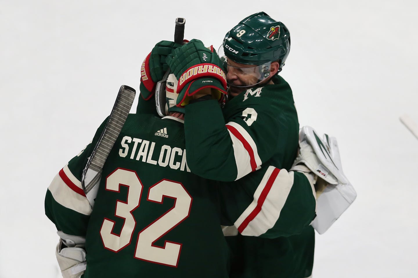 Wild center Mikko Koivu hugged goalie Alex Stalock after Stalock blocked a shot in a shootout to beat the the Dallas Stars 3-2 on Sunday at Xcel Energy Center.