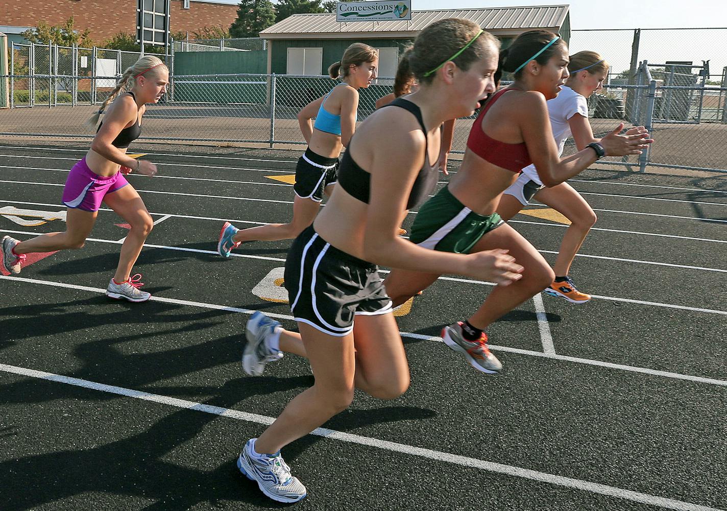 Edina junior Shannon Spalding, center, broke the school&#x2019;s 5K record last year at the Roy Griak Inviational, the only meet that didn&#x2019;t run the usual 4K distance. &#x201c;Some girls were more nervous and afraid of running the extra 1K,&#x201d; Spalding said. &#x201c;That&#x2019;s sad because this is what we should be running, and we were afraid to run it.&#x201d;