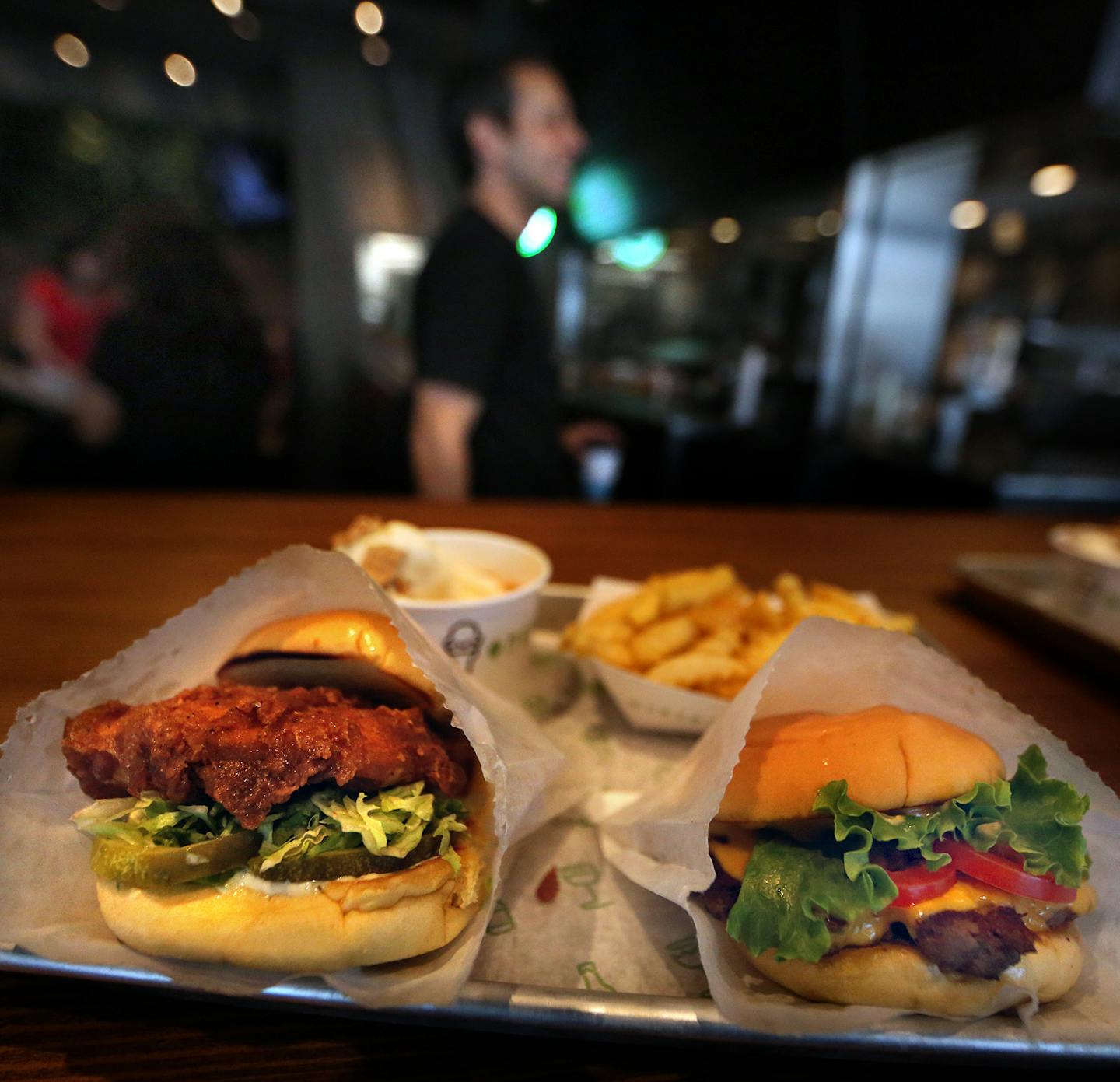 Items on the Shake Shack menu include: a ShackBurger (right); Chick&#xed;n Shack; fries and a Malt of America. ] JIM GEHRZ&#xef;james.gehrz@startribune.com (JIM GEHRZ/STAR TRIBUNE) / June 9, 2016/ 10:30 PM , Bloomington, MN - BACKGROUND INFORMATION: Shake Shack opens its first Minnesota location at Mall of America and the crowds are expected to be huge.