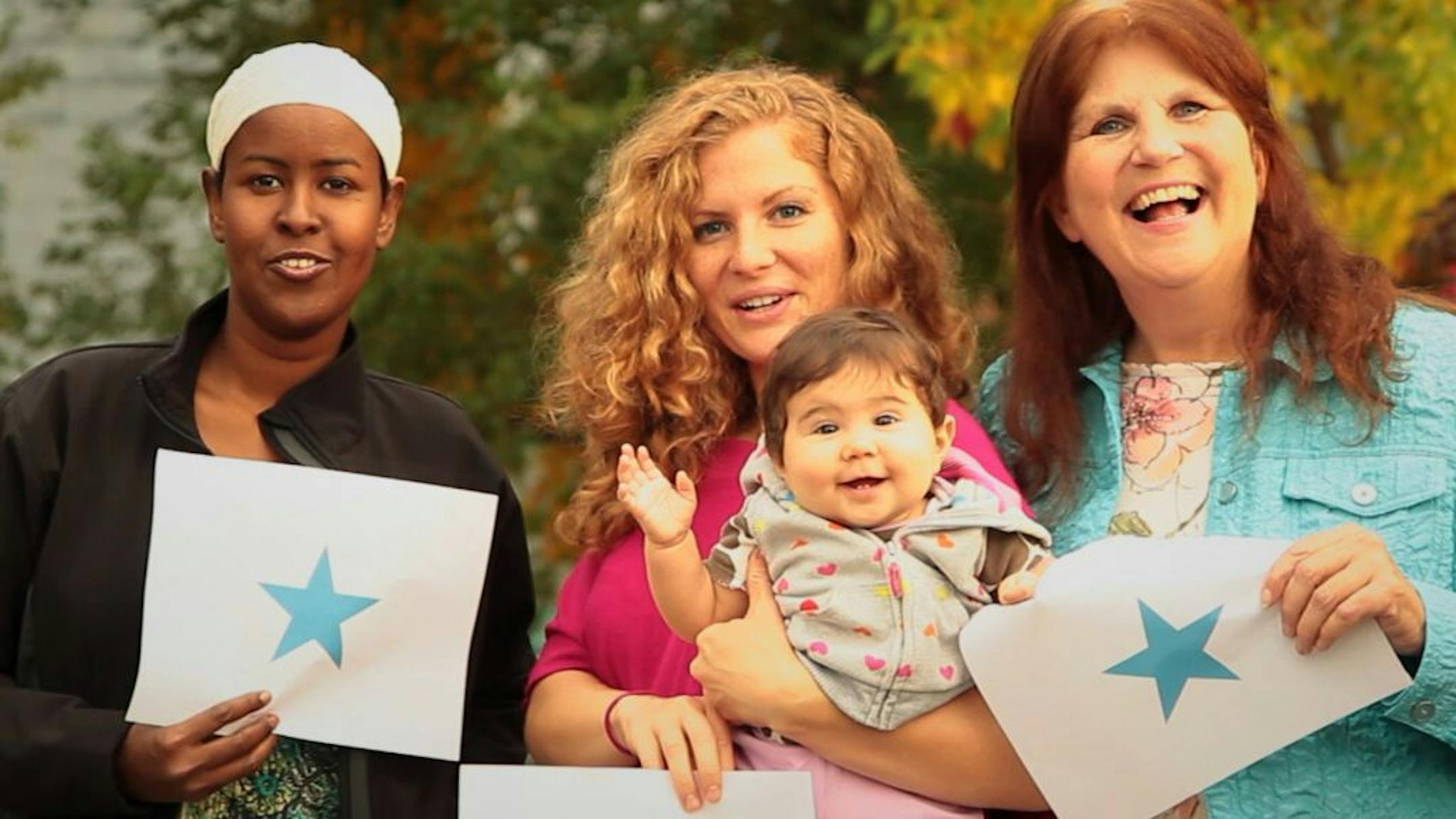 These three friends organized a September fundraising dinner at Somali-owned Safari restaurant in Minneapolis. They are: Ifrah Jimale, Meredith Seaborn, Allison Seaborn (Meredith's mom). The baby's name is Zayna Thabit (Meredith's daughter).