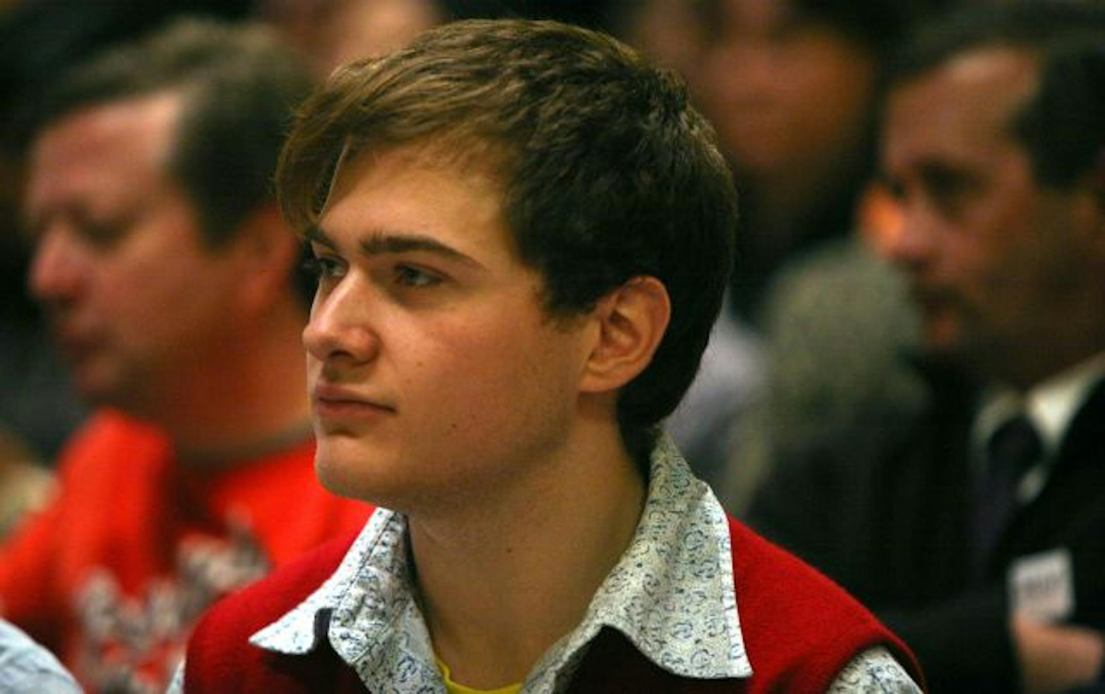 Tim Steeves, 20, listened to speakers at the AIDS Action Day rally at the Capitol.