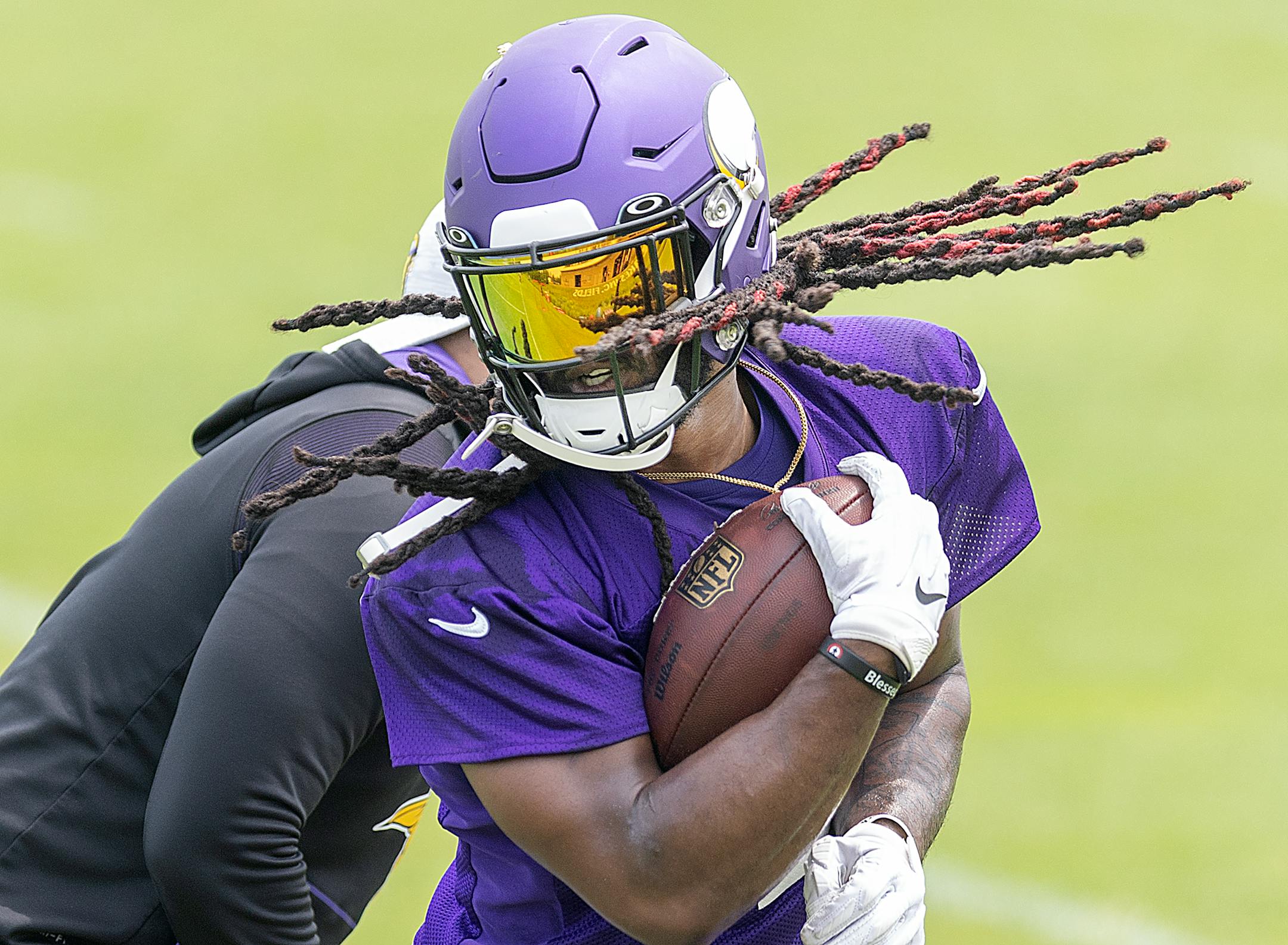 Vikings running back Alexander Mattison runs through drills during practice at the TCO Performance Center in Eagan, Minn., on Tuesday, June 6, 2023.
