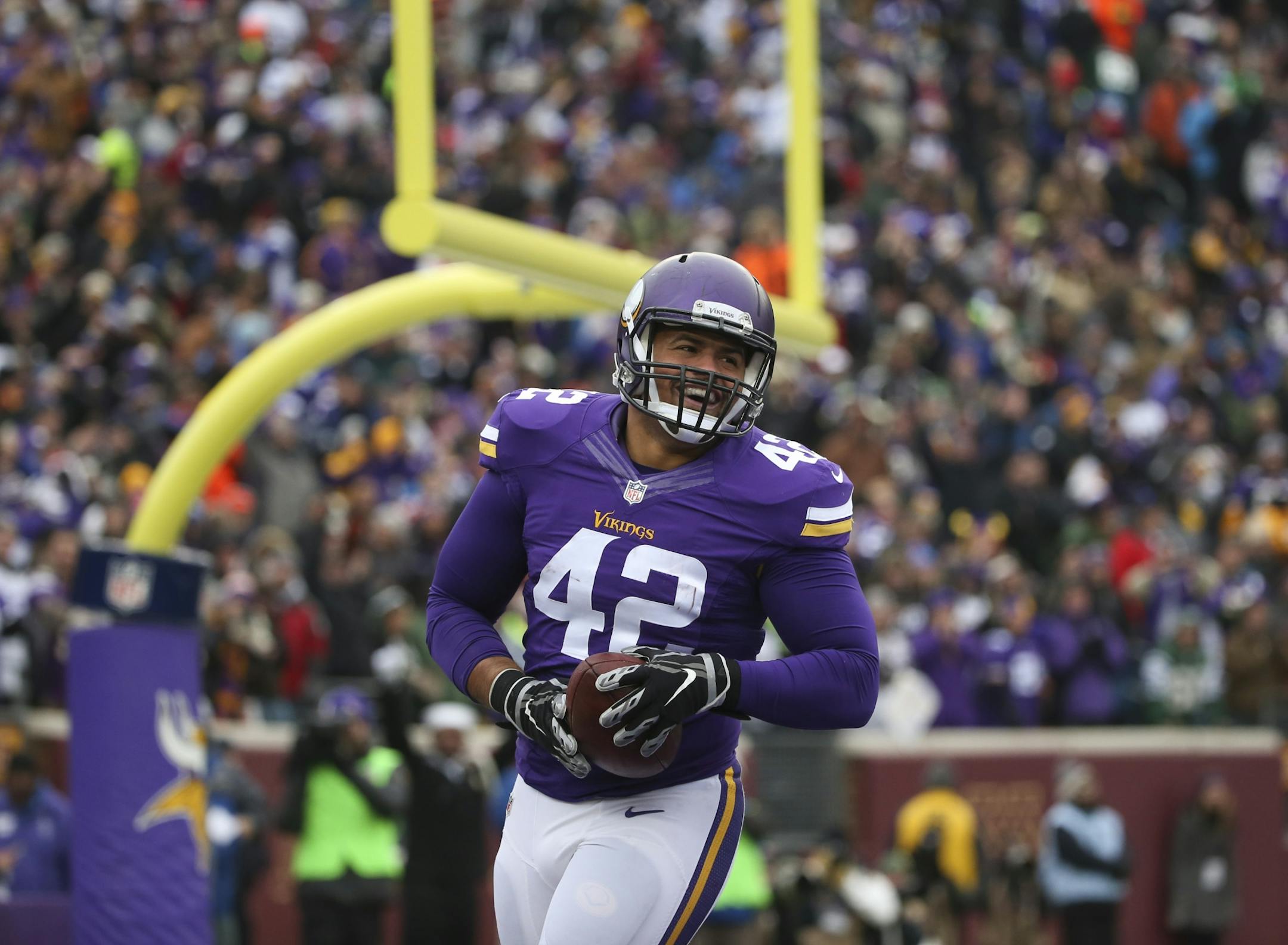 Minnesota Vikings fullback Jerome Felton (42) smiled after he recovered a second quarter fumble in the end zone for his first career touchdown Sunday afternoon.