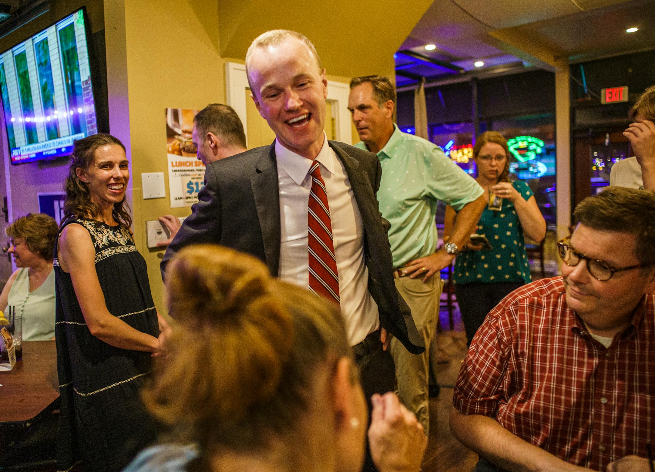 GOP attorney general candidate Jim Schultz thanks supporters Annie Paruccini and Dan Wolter.