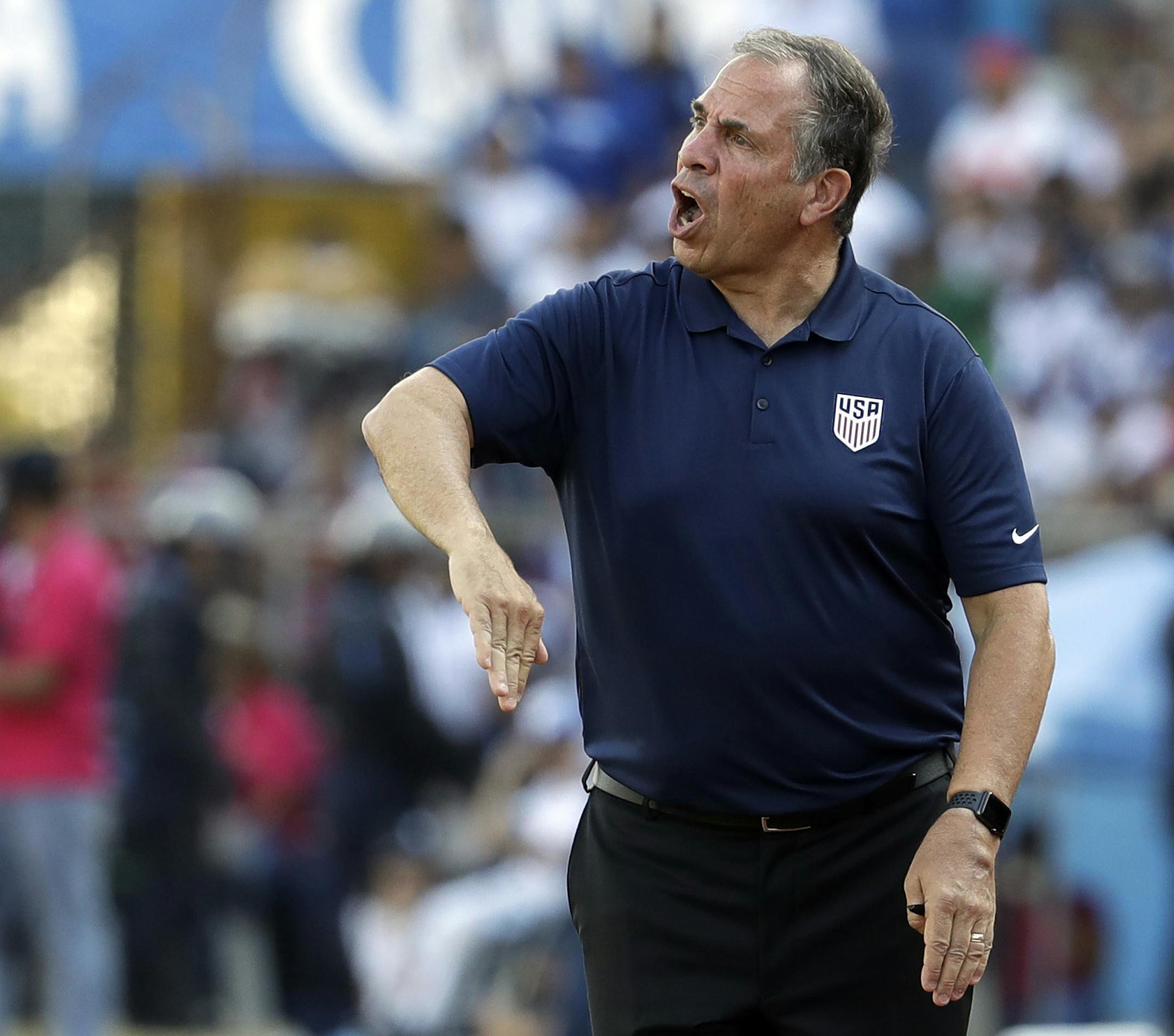 United States coach Bruce Arena gives instructions to his players during a 2018 World Cup qualifying soccer match against Honduras in San Pedro Sula, Honduras, Tuesday, Sept. 5, 2017. (AP Photo/Rebecca Blackwell) ORG XMIT: MIN2017092917334930