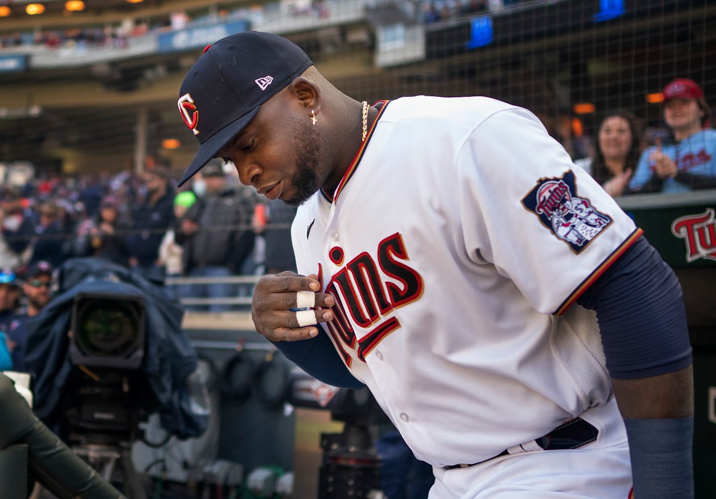 Minnesota Twins first baseman Miguel Sano, (22) takes the field at Target Field during introductions in Minneapolis, Minn., on Friday, April 8, 2022.