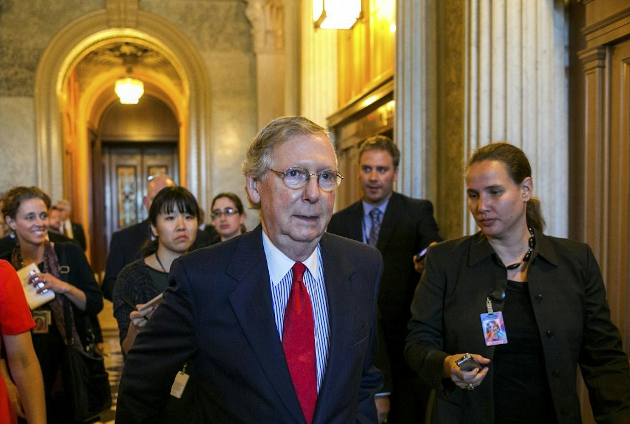 Senate Minority Leader Mitch McConnell (D-Ky.) heads to a GOP Luncheon on the 15th day of the Government shutdown in Washington, Oct. 15 2013. House Republican leaders struggled on Tuesday to craft a proposal to reopen the government and change the new health care law, after a plan presented to the rank-and-file failed to attract enough support.