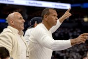 Minority team owners Marc Lore and Alex Rodriguez attend a Timberwolves game in March at Target Center in Minneapolis.