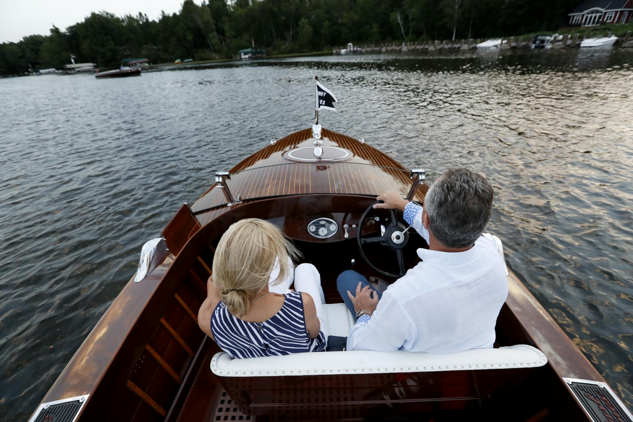 John and Becky Allen in the Johnny Barnes, a 26-foot triple cockpit 1931 Earl C. Barnes powered by a 1931 F Scripps Gold Cup engine built in Gravenhurst Canada.
