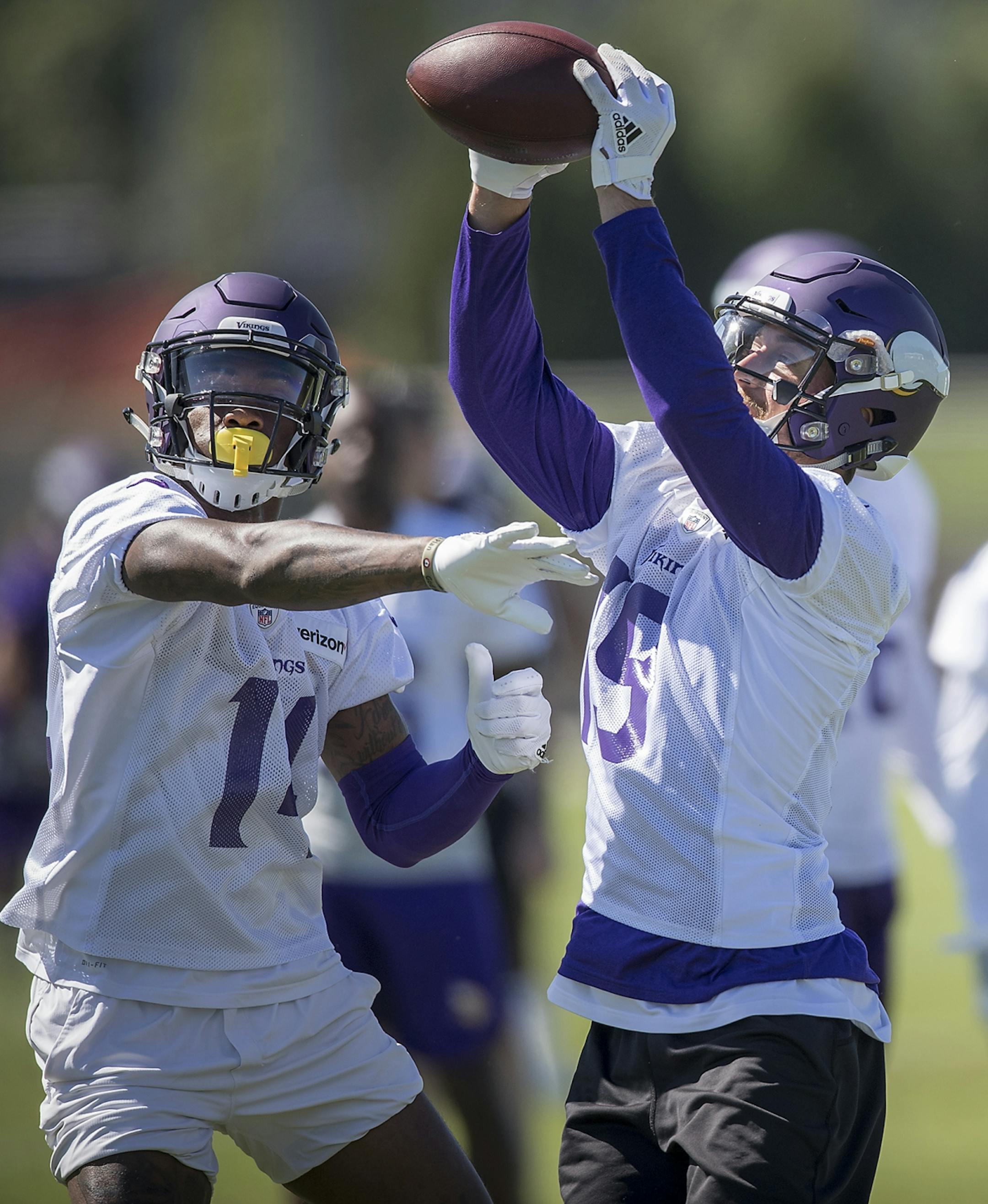 Vikings wide receiver Stefon Diggs, left, and Adam Thielen ran drill during a mandatory Vikings three-day minicamp at the TCO Performance Center, June 13, 2018 in Eagan, MN.