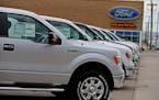 A local Ford dealership keeps a lot full of Ford F-15 trucks on the lot. ] (ELIZABETH FLORES/STAR TRIBUNE) ELIZABETH FLORES &#x2022; eflores@startribu