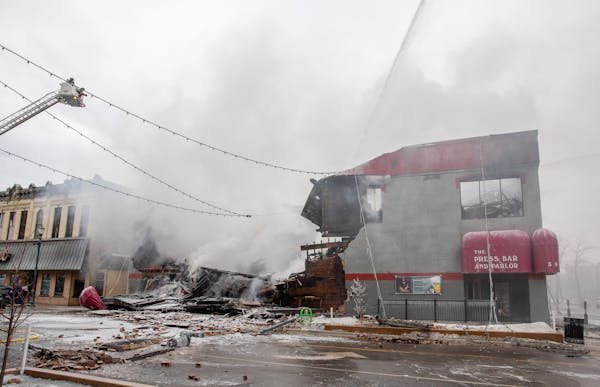 Firefighters from St. Cloud, Sartell and Sauk Rapids battle a major fire in downtown St. Cloud at the Press Bar and Parlor Monday, Feb. 17, 2020, at 5