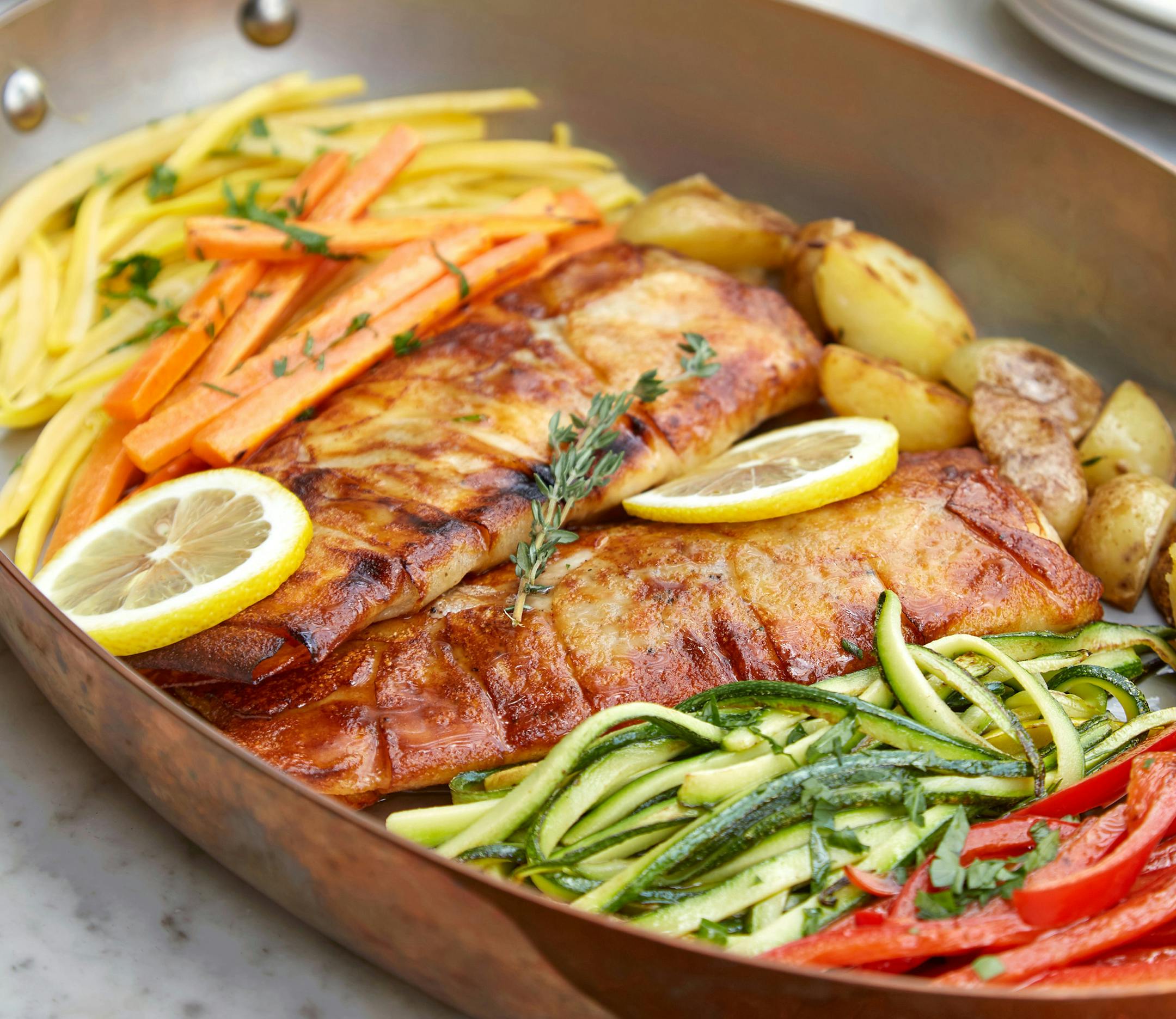 Wrapped Bass Fillet with Pinot Grigio from"Serafina: Modern Italian Cuisin for Everyday Home Cooking," by Vittorio Assaf and Fabio Granato. (Rizzoli, 2022). Photo: Mark Roskams