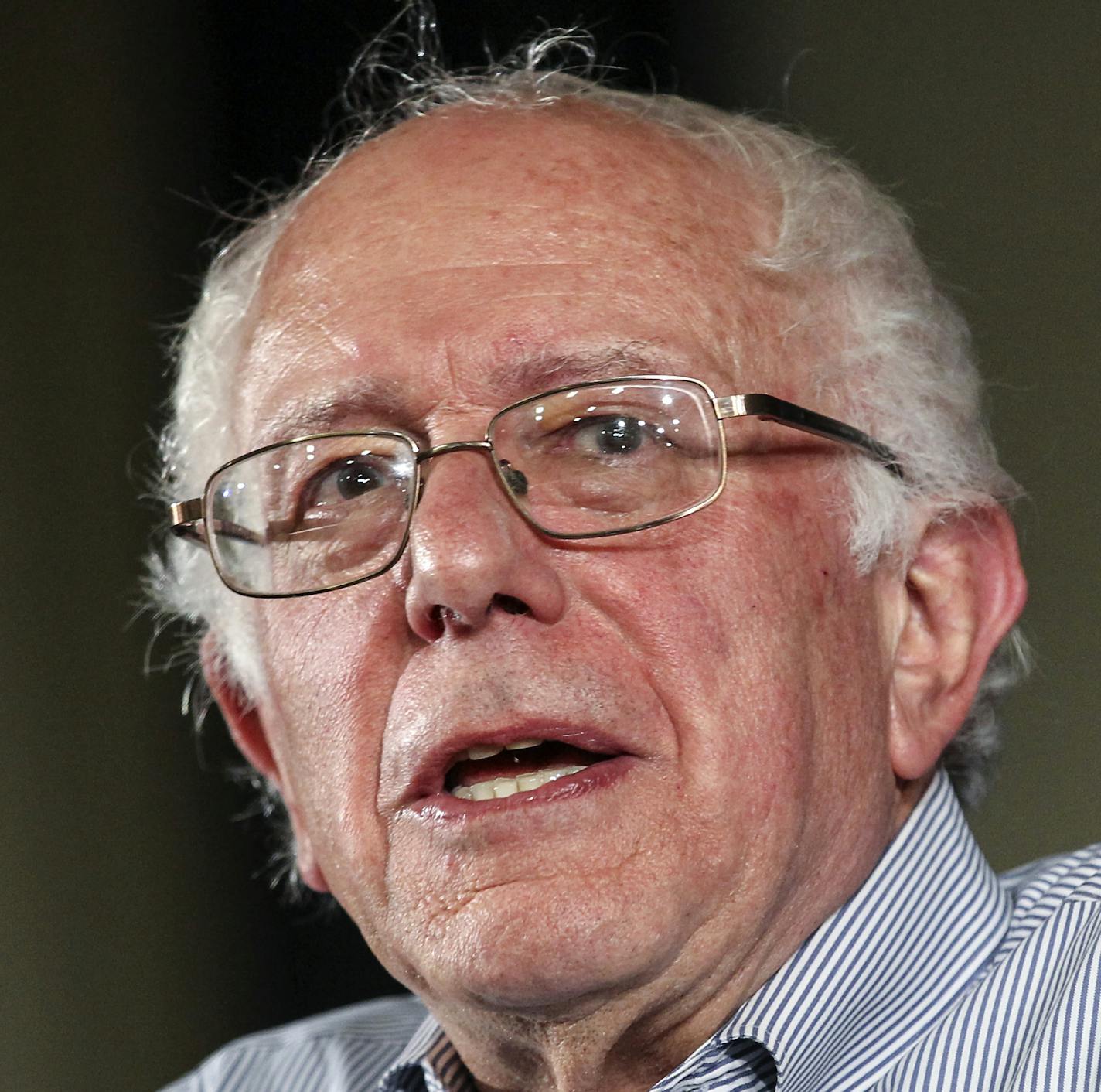 FILE - In this Aug. 23, 2015 file photo, Democratic presidential candidate Sen. Bernie Sanders, I-Vt. speaks in Salem, N.H. The Democratic National Committee barely has more cash than it does IOUs, and it is being outraised month after month by its Republican counterpart. Its $24 million debt from the 2012 presidential election, only recently paid down, has squeezed investments in the next White House race. Underdeveloped party resources such as voter data files could become a serious disadvanta