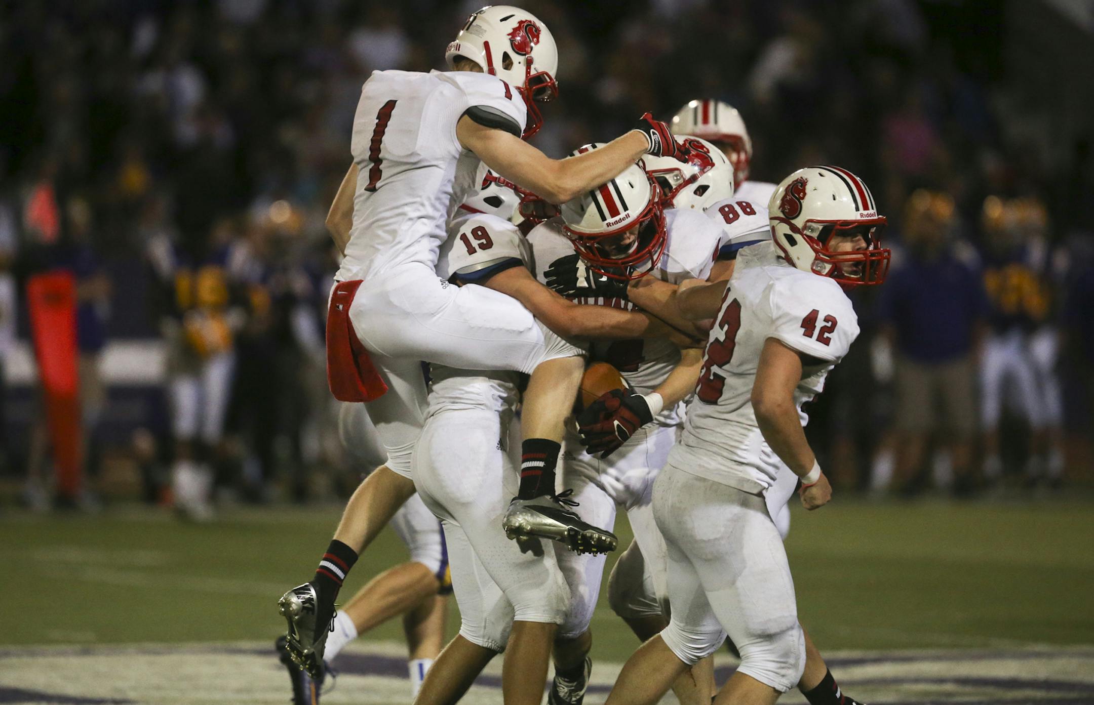 In the final minute of their 21-7 upset win over Cretin-Derham Hall players mob Ian Weisbrod (44, buried in the middle) after the linebacker picked off a pass Friday, Sept. 13, 2013, at the University of St. Thomas , in St. Paul, MN.](DAVID JOLES/STARTRIBUNE) djoles@startribune.com Stillwater High and Cretin-Derhham Hall High at the University of St. Thomas broadcast live on ESPN2. The player most responsible for attracting the network‚Äôs interest is junior Jashon Cornell, a 16