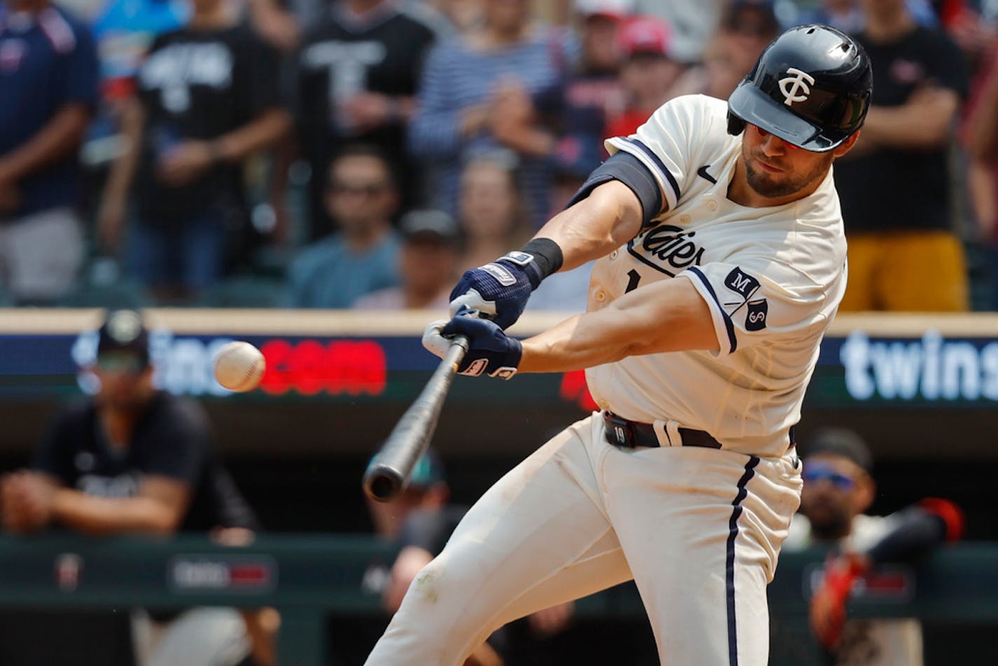 Minnesota Twins' Alex Kirilloff hits an RBI double to tie a baseball game with the Chicago White Sox in the ninth inning Sunday, July 23, 2023, in Minneapolis. (AP Photo/Bruce Kluckhohn)