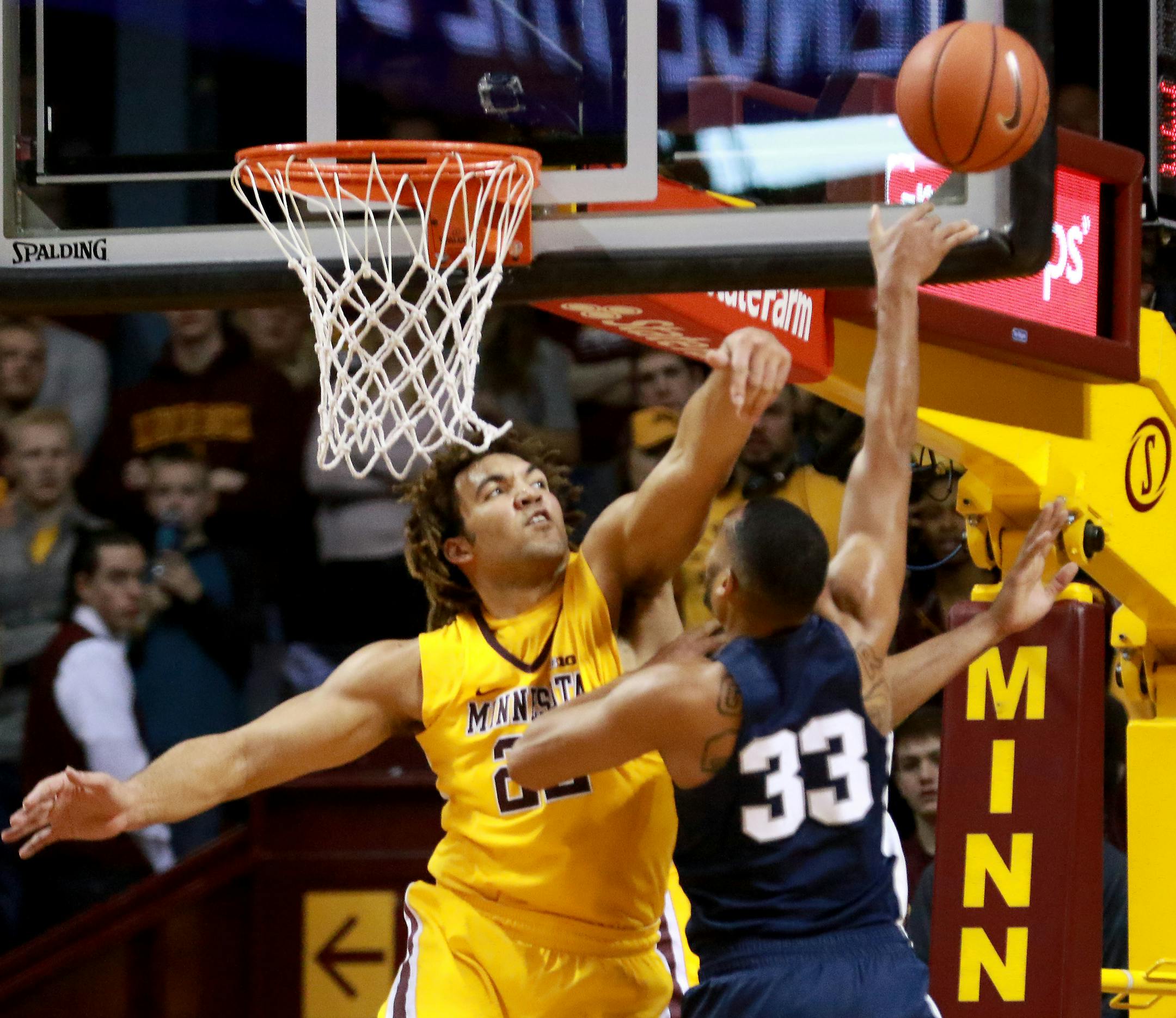 The University of Minnesota's Reggie Lynch (22) set the school's single-season shot block record on this rejection of Penn State's Shep Garner (33) in the second half of the Gopher's 81-71 win Saturday, Feb. 25, 2017, at Williams Arena in Minneapolis, MN.] DAVID JOLES � david.joles@startribune.com Gophers vs. Penn State, men's basketball