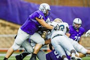 David Simmet (75) applies a tackle during a football game against Bethel University October 24, 2015 at O'Shaughnessy Stadium. The Tommies beat the Ro