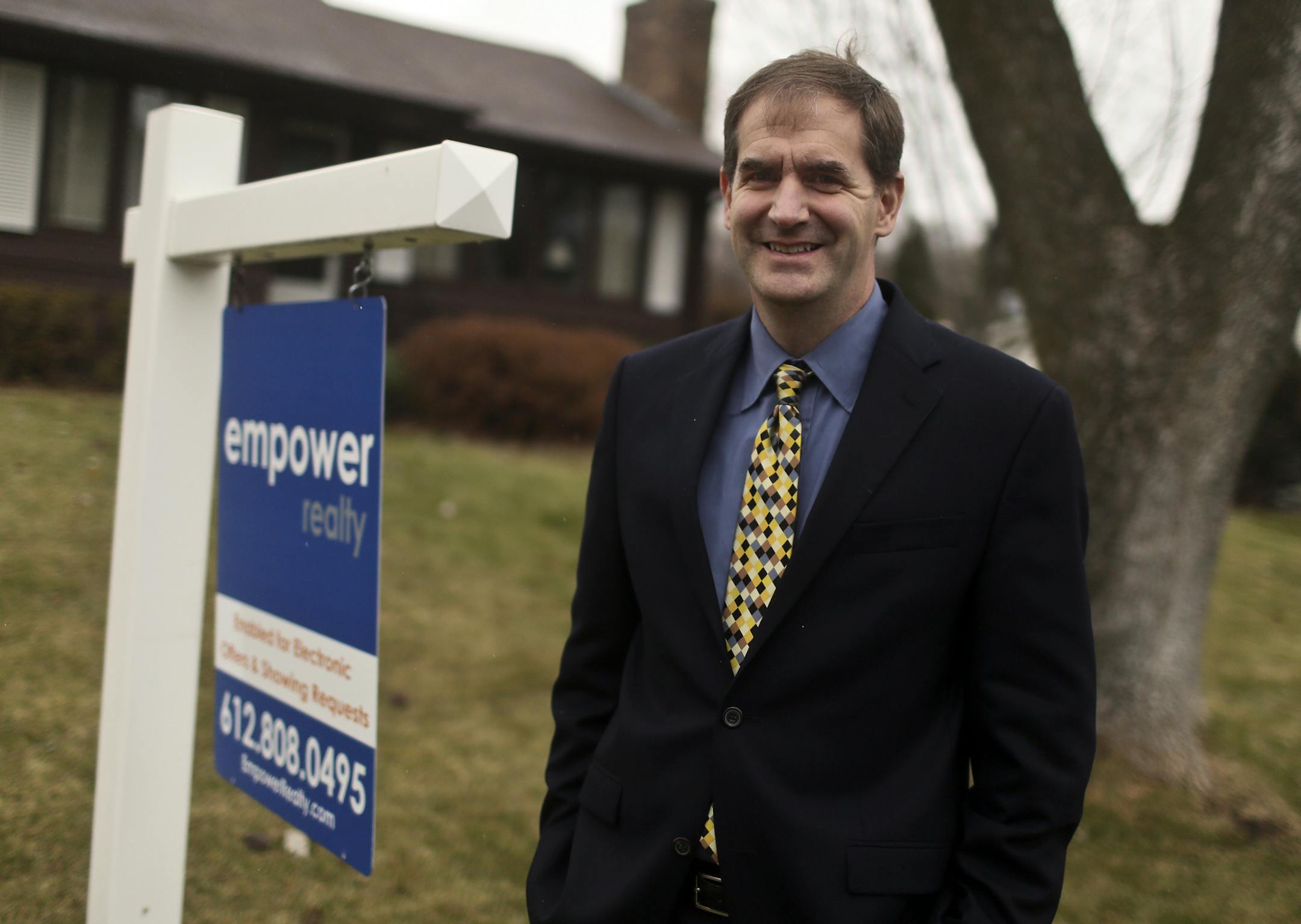 Twin Cities entreprenueur, Jim Lesinski seen outside his first home listing for his new business Empower Realty Thursday, Nov. 21, 2013, in Burnsville, MN.](DAVID JOLES/STARTRIBUNE) djoles@startribune.com Twin Cities entreprenueur, Jim Lesinski, recently launched what he says is the nation's first virtual real estate brokerage, and is offering a special Black Friday discount to people who are planning to sell their homes. Lesinski says that the discount brokerage is aimed at younger, tech-savvy