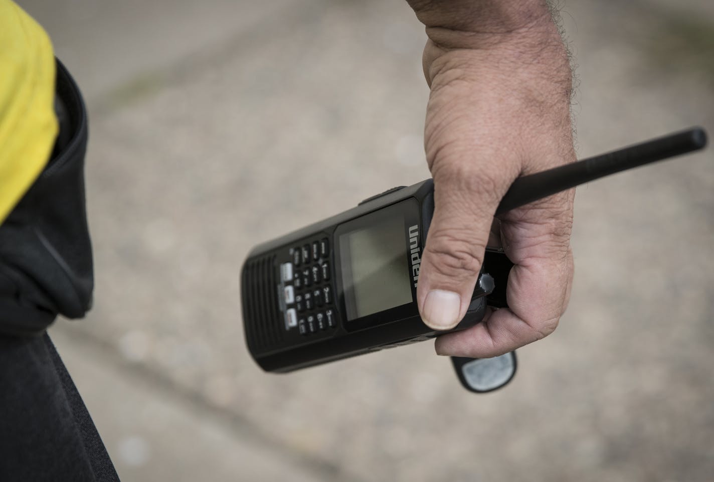 Phillip Murphy holds a scanner he keeps with him at all times at his closed down flower shop on Dowling Avenue in north Minneapolis, Minn., on August 26, 2016. Murphy is very frustrated with the amount of gun violence in the area of his shop and keeps track of the statistics regularly. "No change can happen unless the community is aware," said Murphy about why he keeps track of the violence and posts it to social media. He closed his flower shop after vandalism and the five armed robberies since