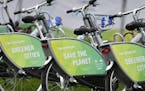 Bicycles reading "save the planet" wait for customers at the COP 23 Fiji UN Climate Change Conference in Bonn, Germany, Monday, Nov. 6, 2017. (AP Phot
