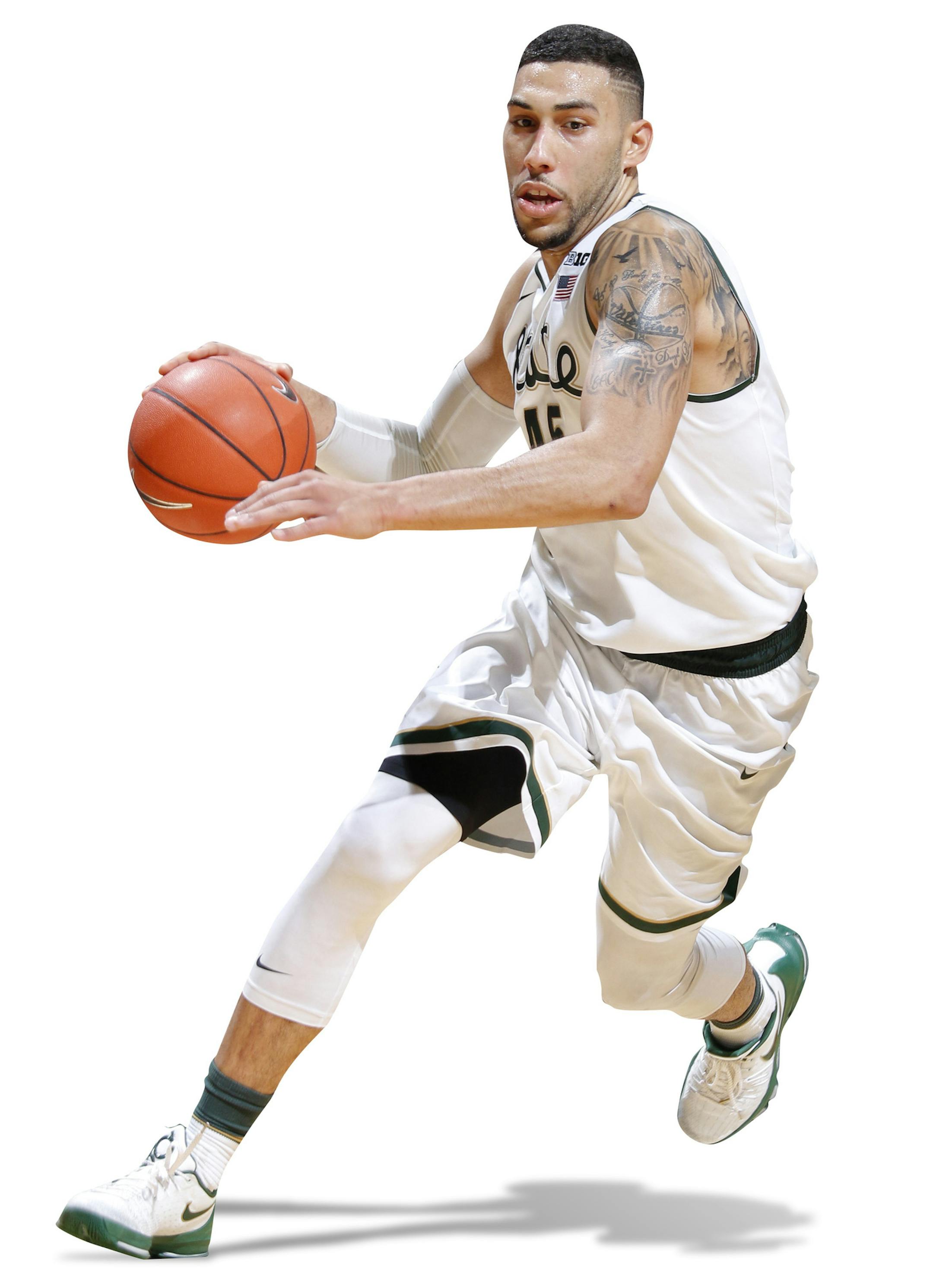 Michigan State's Denzel Valentine drives to the basket during the second half of an NCAA college basketball game against Louisville, Wednesday, Dec. 2, 2015, in East Lansing, Mich. Michigan State won 71-67. (AP Photo/Al Goldis) ORG XMIT: otkag103