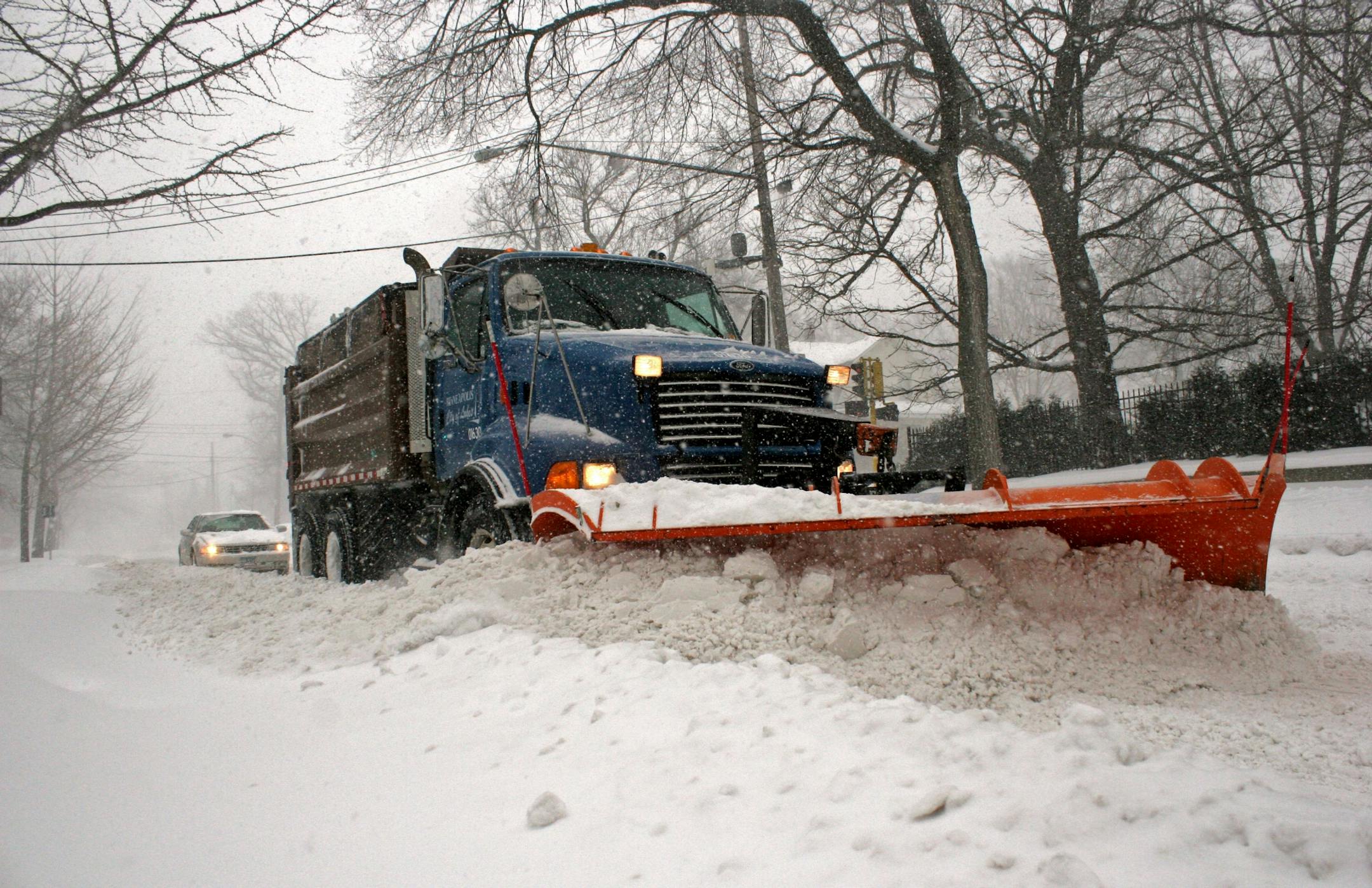 A Minneapolis snowplow works its way down west 44th St. near Xerxes Ave. Saturday afternoon.