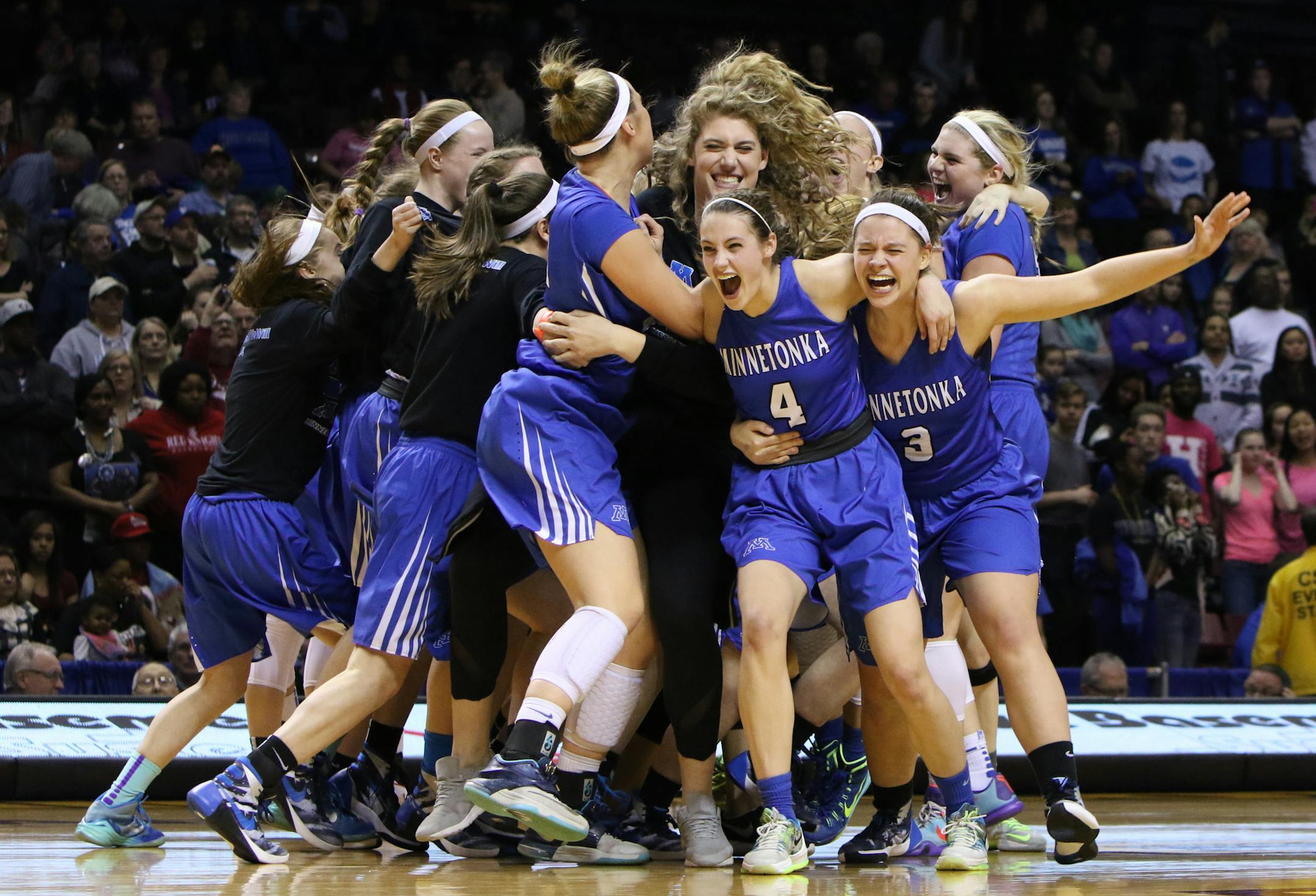 Minnetonka High School celebrates a win in the Class 4A Finals of the 2016 MSHSL Girls Basketball Tournament on March 19, 2016 at Williams Arena on the campus of University of Minnesota in Minneapolis, Minn. ] Special to Star Tribune, Matt Blewett | matt@mattebphoto.com, Matte B Photography, 2016 MSHSL Girls Basketball Tournament, Minnetonka High School, Hopkins High School, 41655 PREP032016