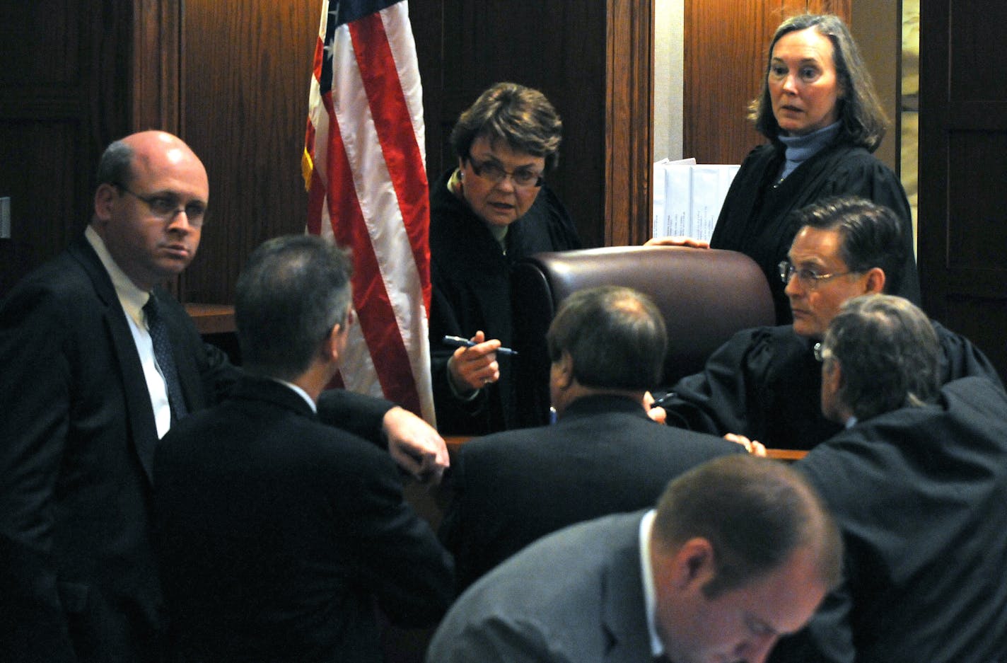 Judge Elizabeth Hayden, center, calls a bench hearing with attorneys for Al Franken and Norm Coleman during the U.S. Senate election trial at the Minnesota Judicial Center in St. Paul.