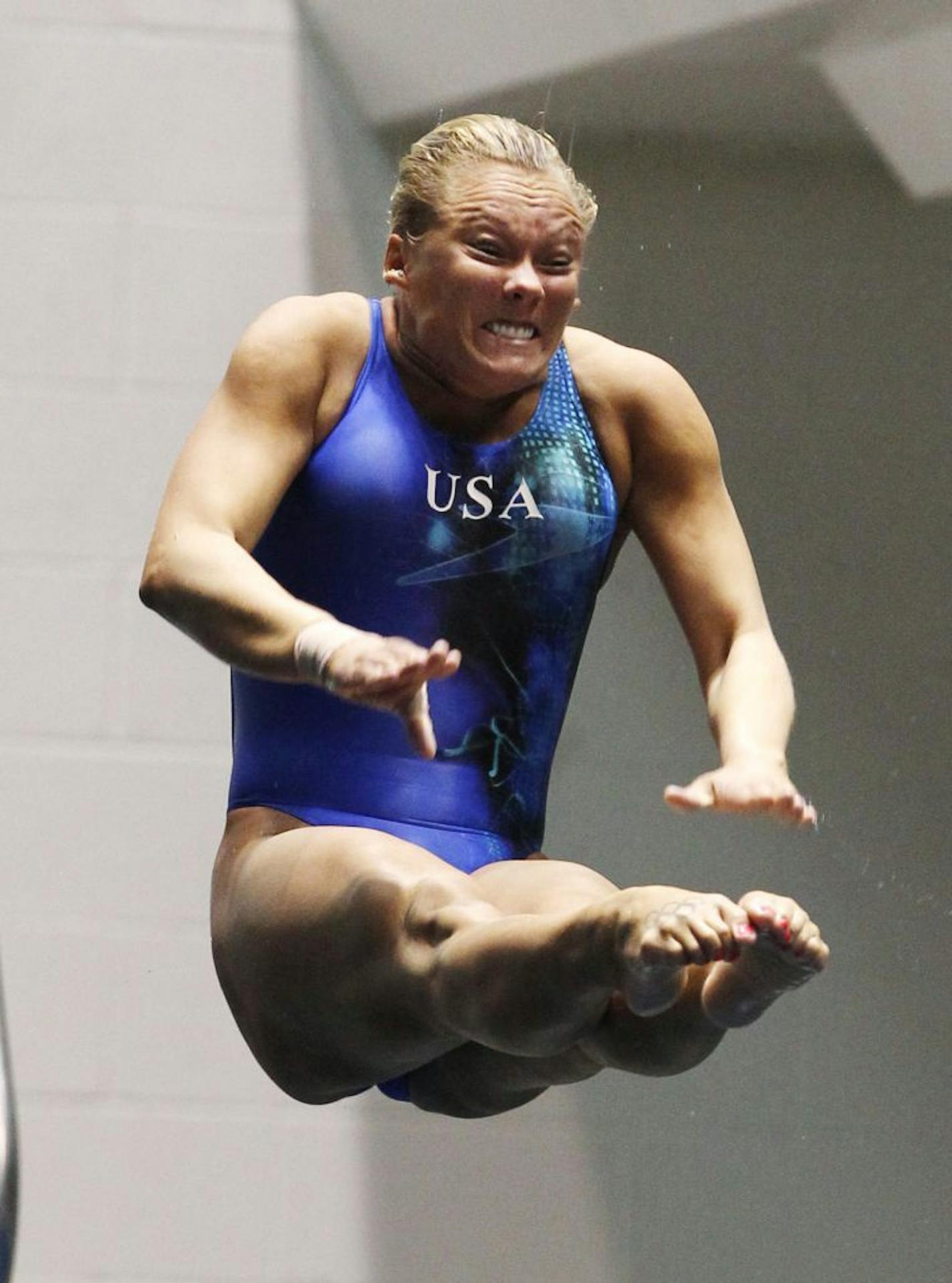 Kelci Bryant dives in the women's 3-meter springboard final at the U.S. Olympic diving trials on Saturday, June 23, 2012, in Federal Way, Wash. (AP Photo/Elaine Thompson