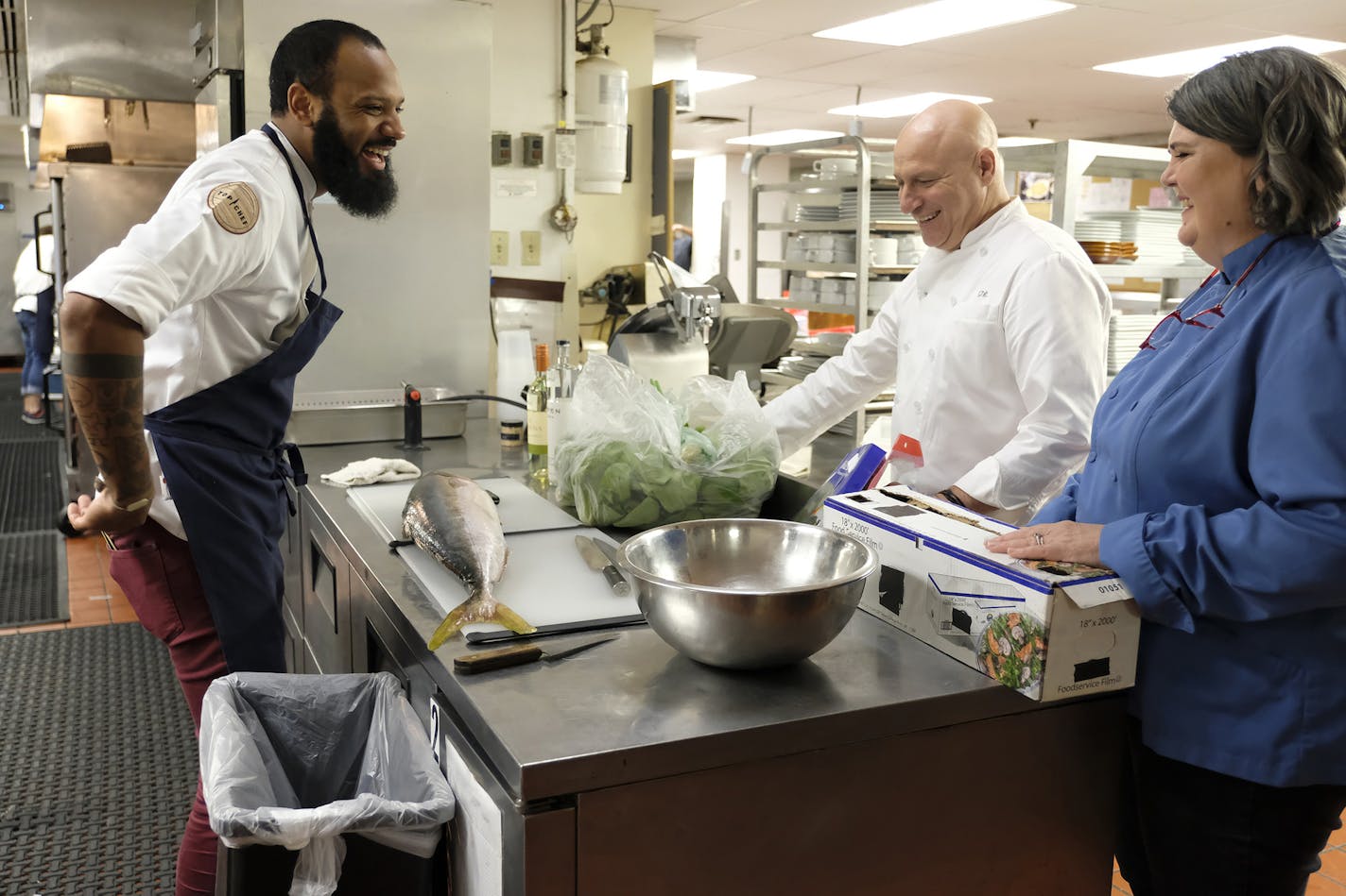 TOP CHEF -- "Kentucky Farewell" Episode 1612 -- Pictured: (l-r) Justin Sutherland, Tom Colicchio, Ouita Michel -- (Photo by: David Moir/Bravo) ORG XMIT: Season:16