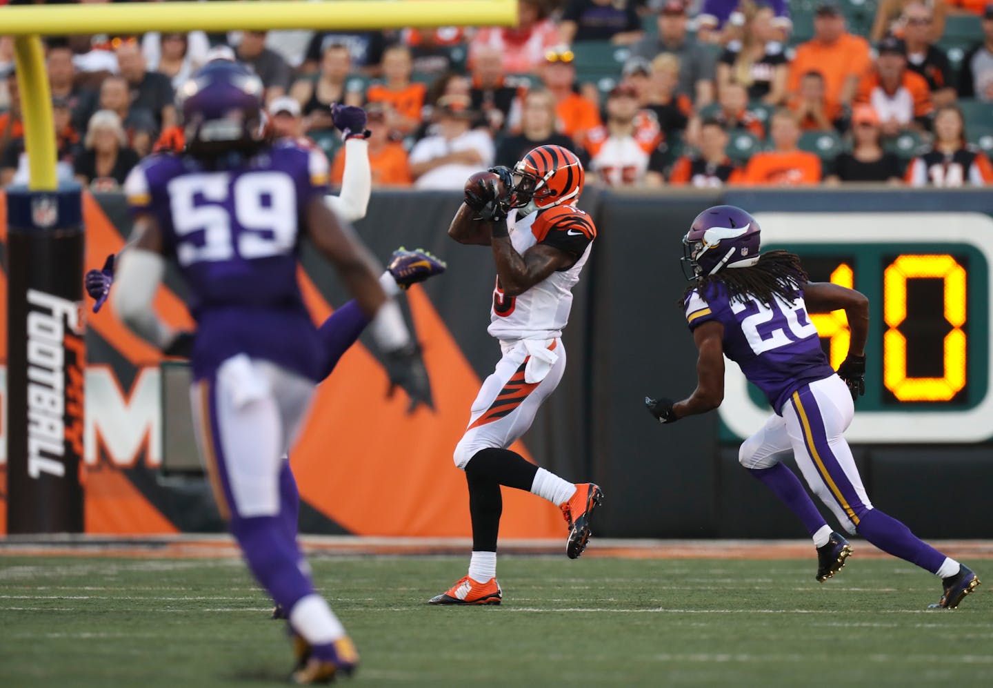 Cincinnati Bengals wide receiver Brandon Tate (19) caught a pass in front of Minnesota Vikings cornerback Trae Waynes (26)