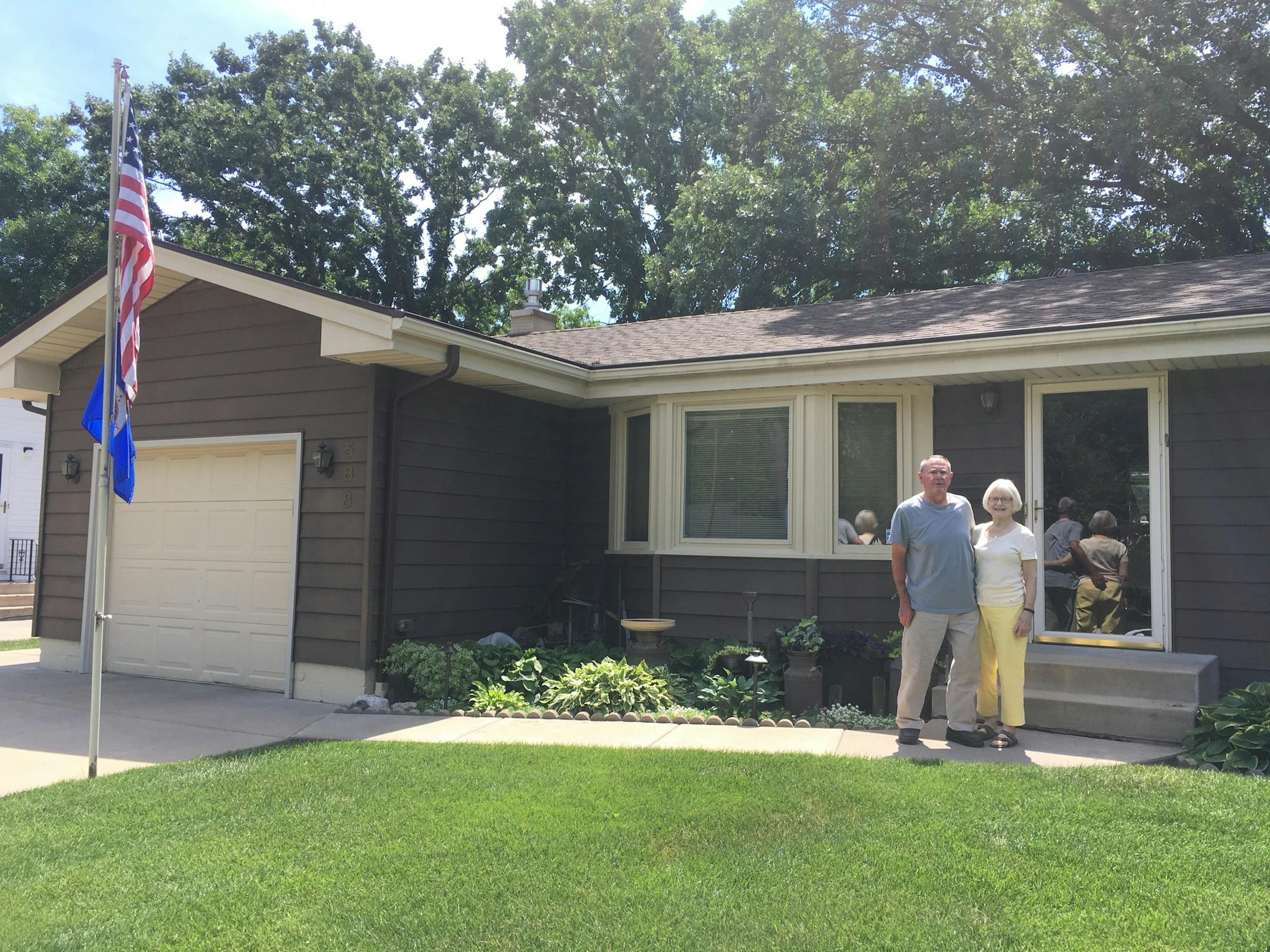 Warren Olson, left, is the original owner of his 1961 rambler in Fridley, which survived the 1965 tornadoes. Olson and his second wife, Lilly, will be showing their house off Sunday in Fridley's first historic home and garden tour amid growing efforts to highlight the historical importance of the rambler.