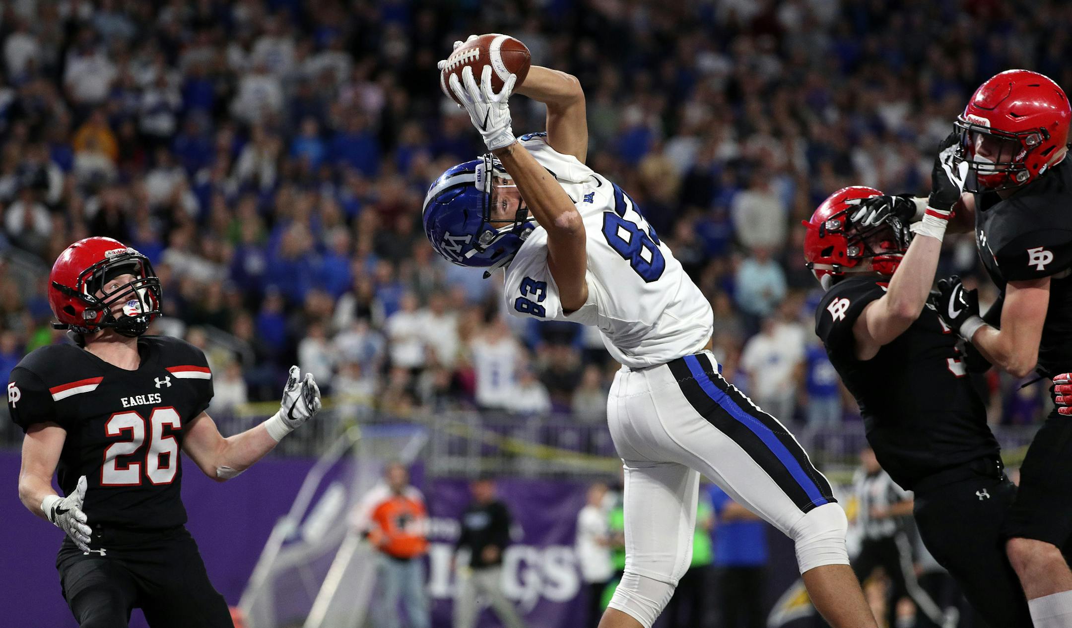 Minnetonka High School wide receiver Jackson Owens (83) caught a long touchdown pass from Minnetonka High School quarterback Aaron Syverson (6) in the final minute of the first half. ] ANTHONY SOUFFLE ï anthony.souffle@startribune.com Game action from a Class 6A championship football game between Eden Prairie High School and Minnetonka High School Friday, Nov. 24, 2017 at U.S. Bank Stadium in Minneapolis.