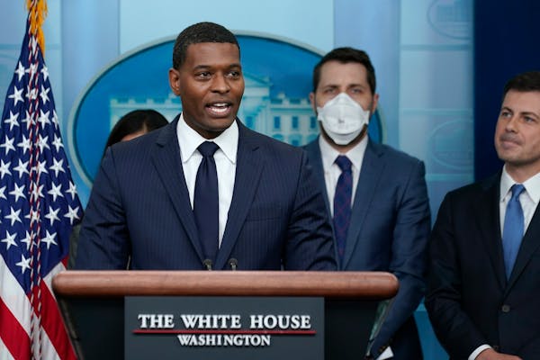 Environmental Protection Agency administrator Michael Regan, left, spoke during a briefing at the White House in Washington on May 16.