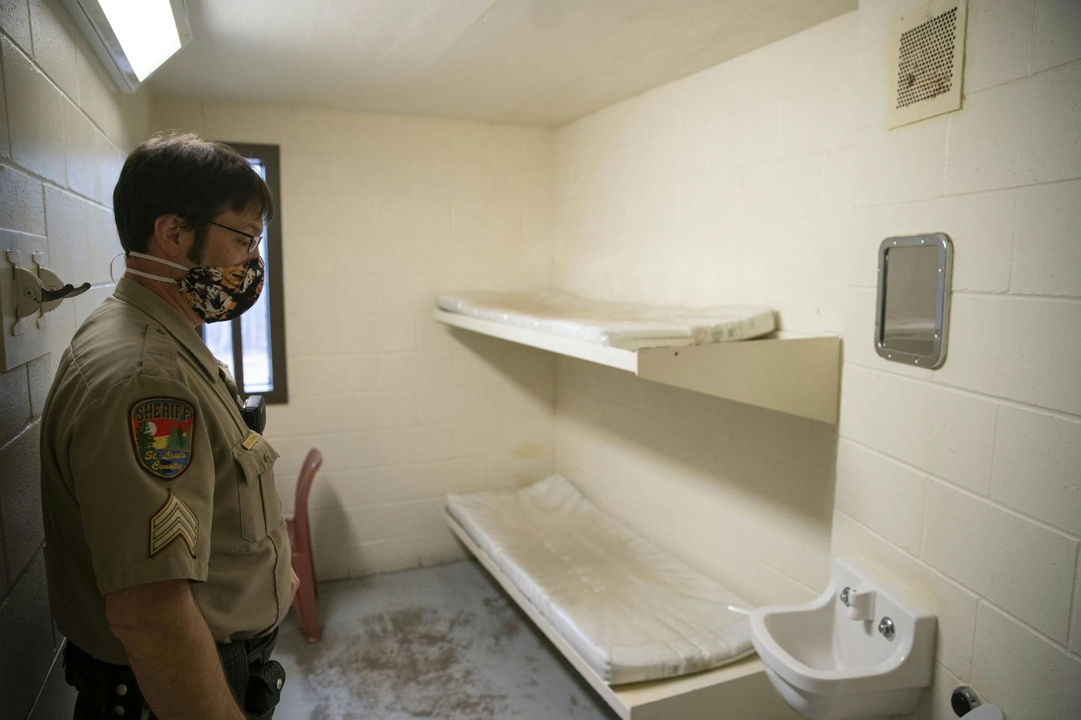 Sergeant Erich Stabs checked out an empty cell in the St. Louis County jail on Tuesday morning.