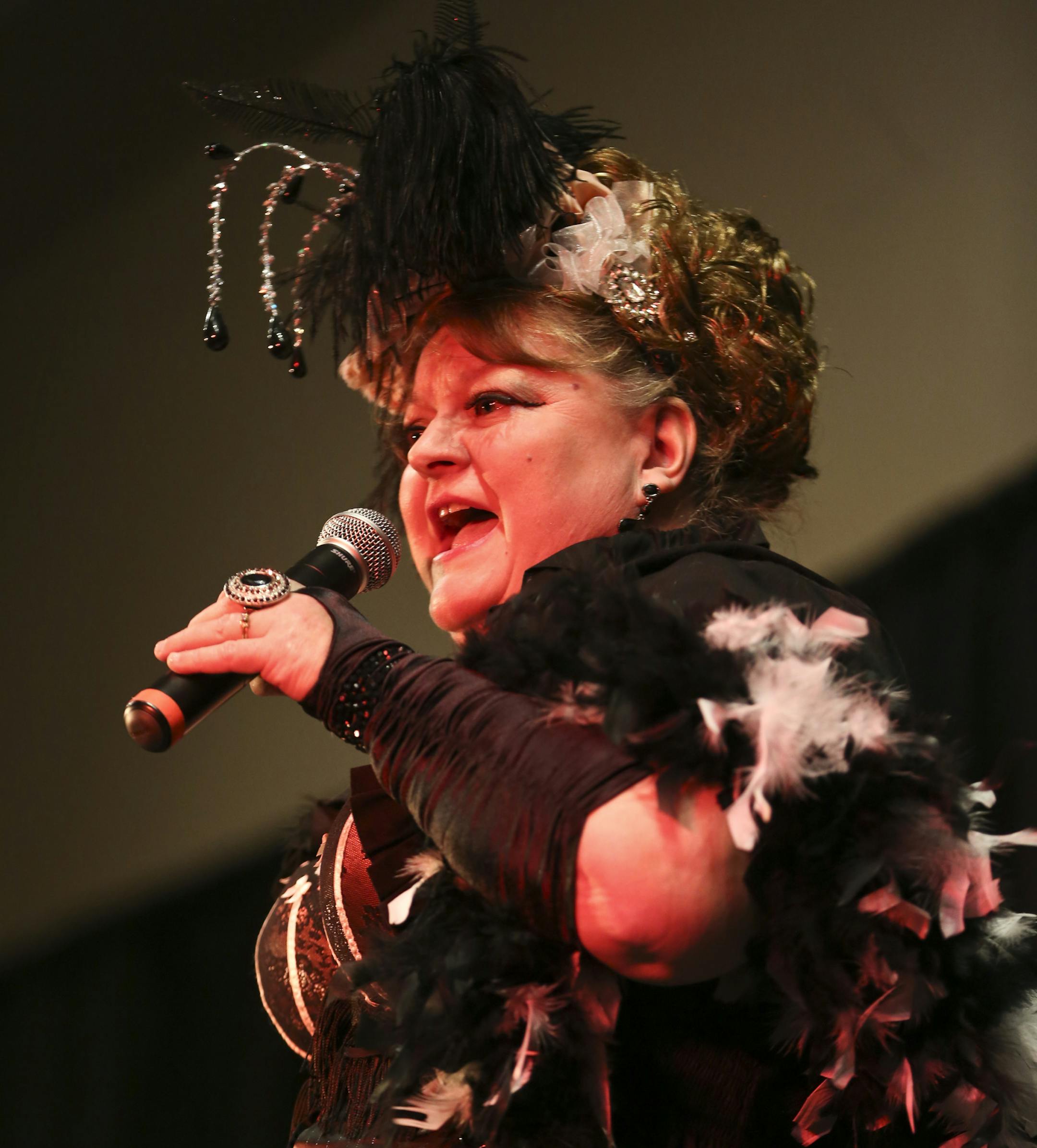 Shelley Brown performed as she competed in the 2014 Klondike Kate competition in Oakdale, Minn., on Wednesday, January 8, 2014. During the contest six contestants performed up to three songs and were judged on their singing abilities, song choice, costumes, crowd appeal, and their portrayal of the real-life character of Klondike Kate, a woman who struck it rich in the Gold Rush of 1898 as the most famous dance hall girl in the north and has since become a symbol of fun, frivolity and good fellow