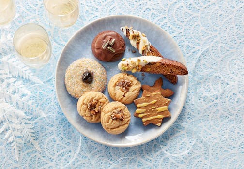 The winning cookies for the 2022 Star tribune Holiday Cookie Contest: Maple-Roasted Walnut Delights, Cherry Cardamom Buttons, Grasshoppers, Gingerbreaf Cornmeal Biscotti and Spiced Orange and Rye Shortbread Cookies. Photo by Dennis Becker