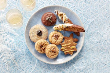 The winning cookies for the 2022 Star tribune Holiday Cookie Contest: Maple-Roasted Walnut Delights, Cherry Cardamom Buttons, Grasshoppers, Gingerbrea