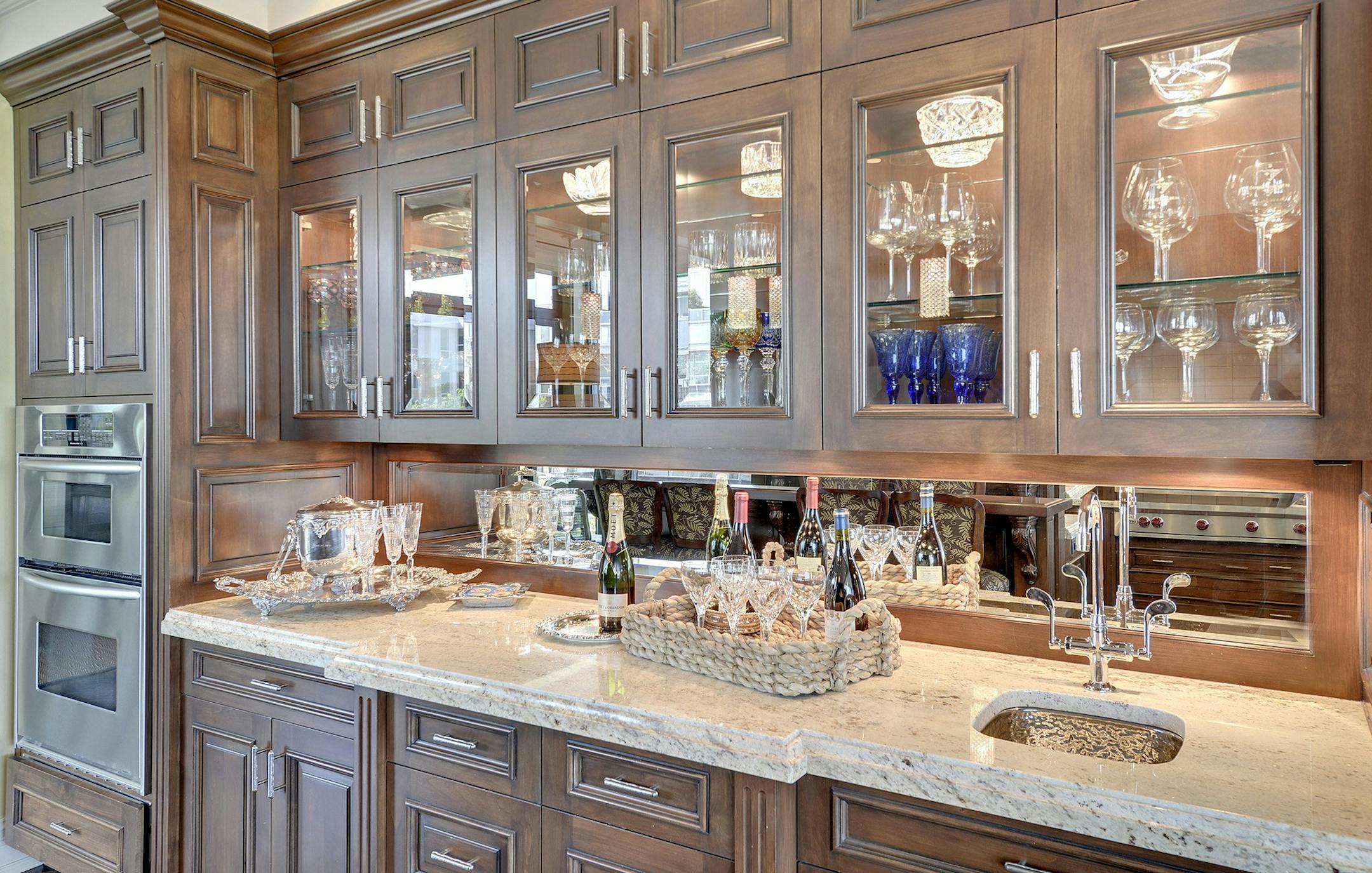 The kitchen features alder cabinets and multi-height counters.